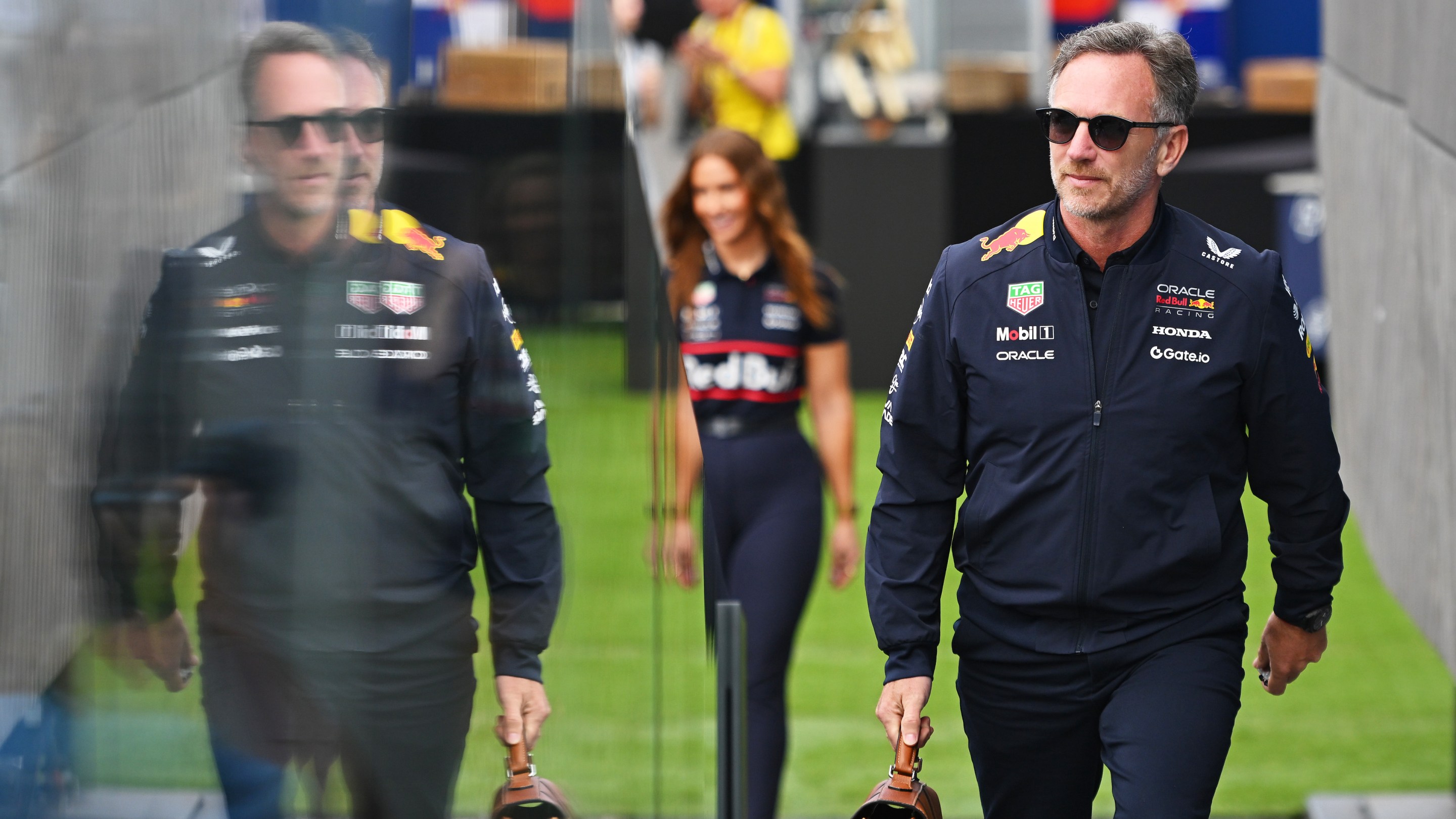 Christian Horner, Team Principal of Oracle Red Bull Racing walks in the Paddock prior to practice.