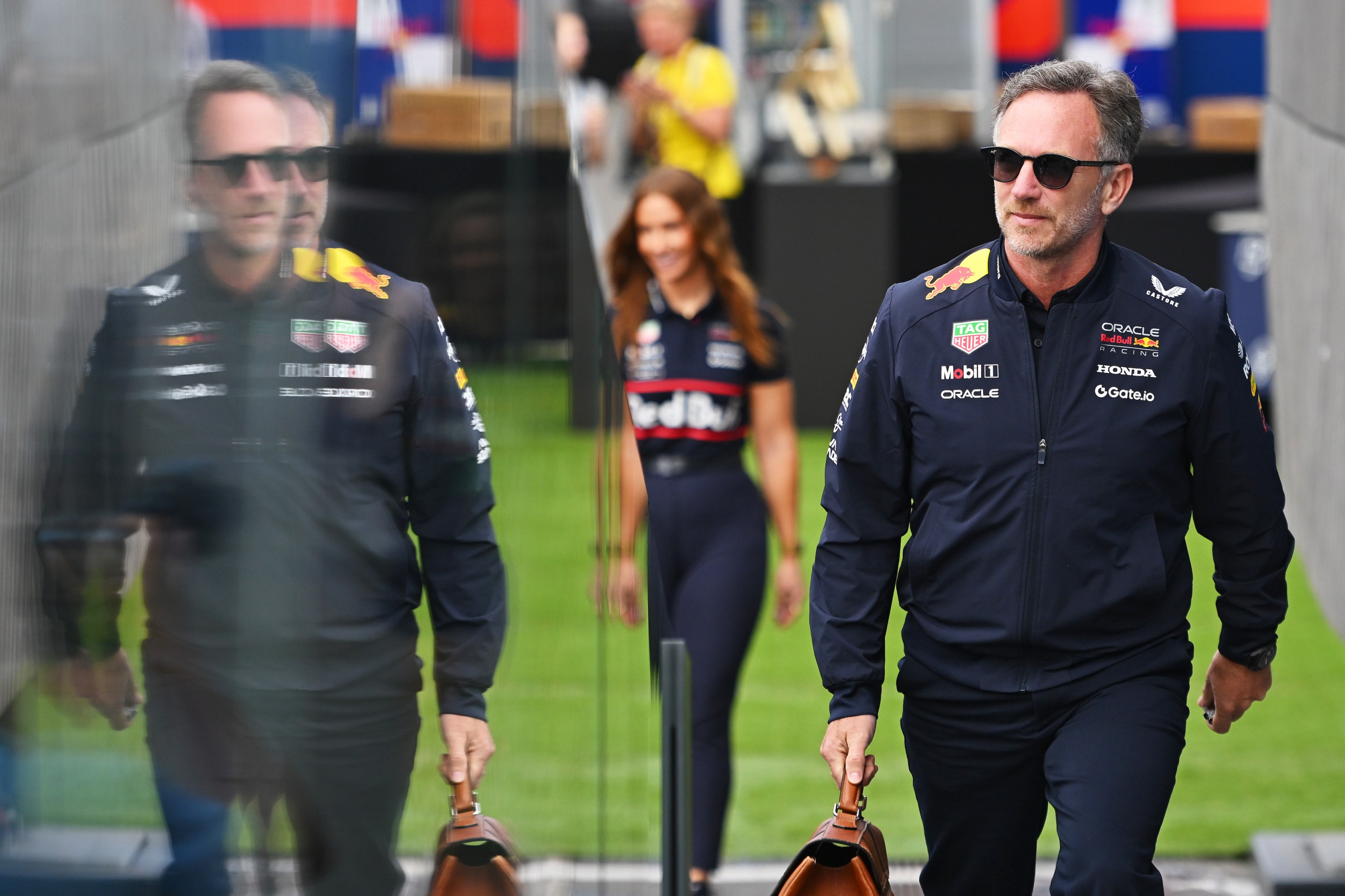 Christian Horner, Team Principal of Oracle Red Bull Racing walks in the Paddock prior to practice.
