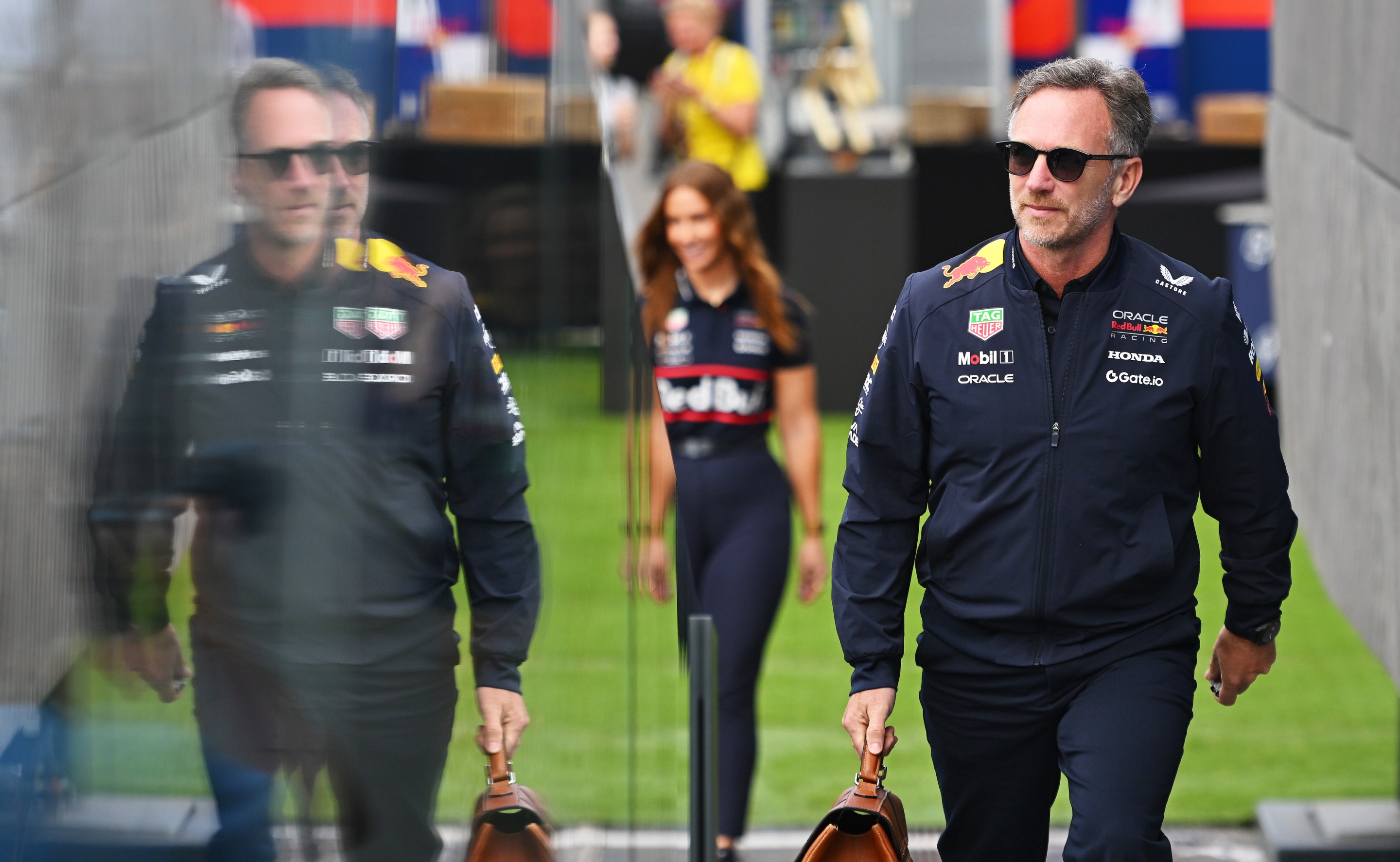 Christian Horner, Team Principal of Oracle Red Bull Racing walks in the Paddock prior to practice.