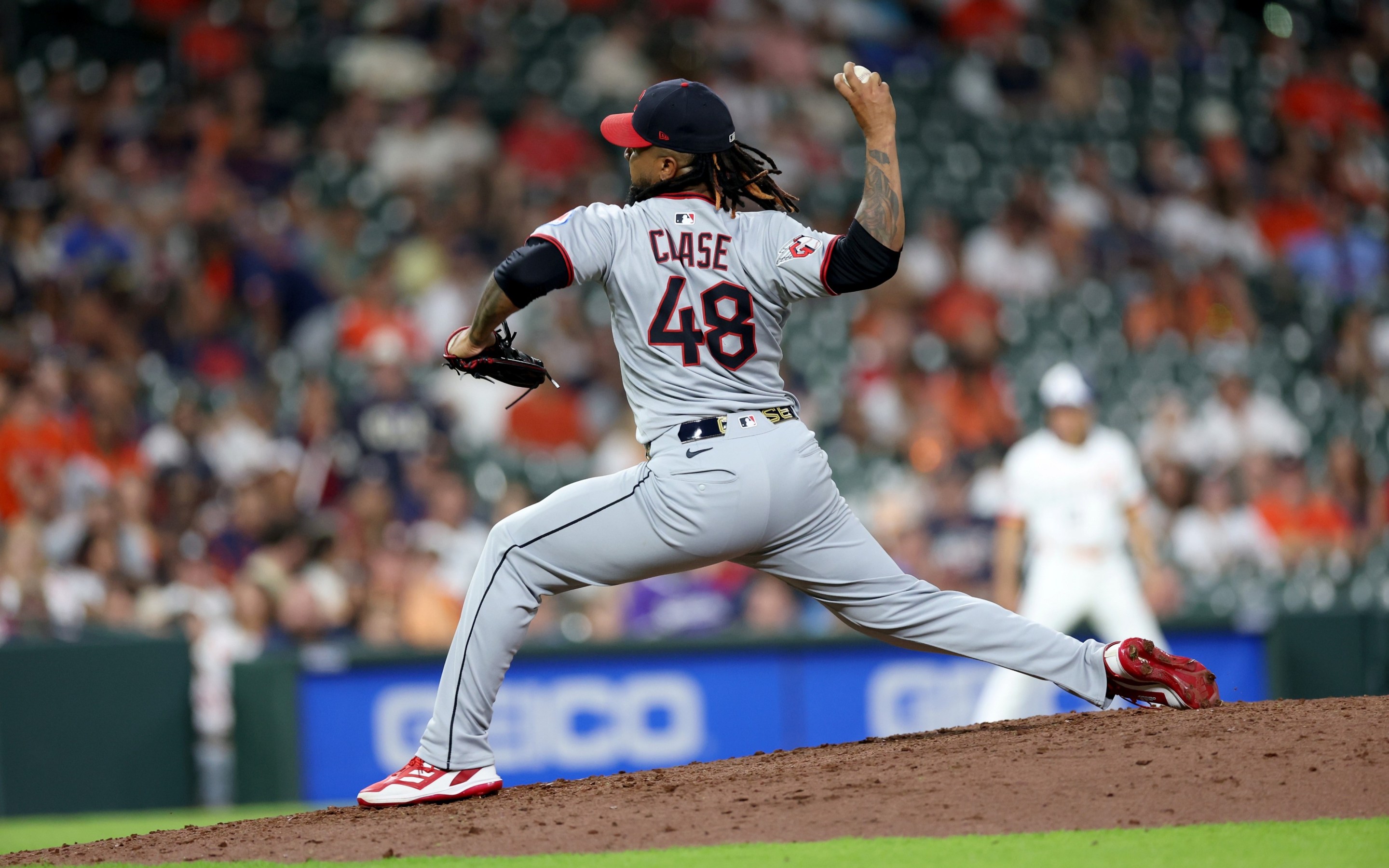 Emmanuel Clase #48 of the Cleveland Guardians pitches in the ninth inning against the Houston Astros.