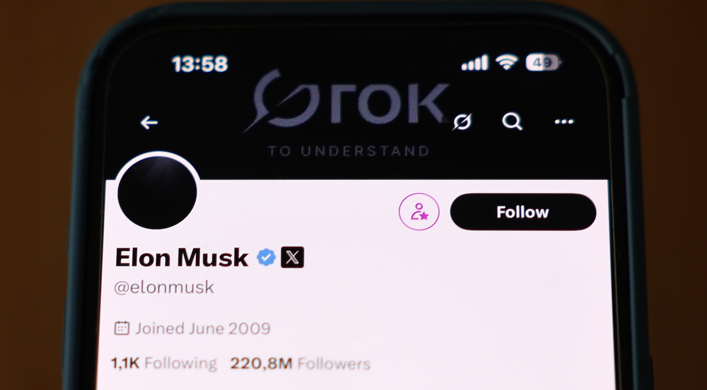 Elon Musk account on X displayed on a phone screen with a Grok header