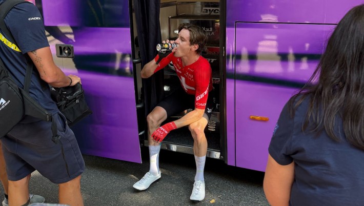 Mauro Schmid drinks from a can after Stage 11 of the 2025 Tour de France