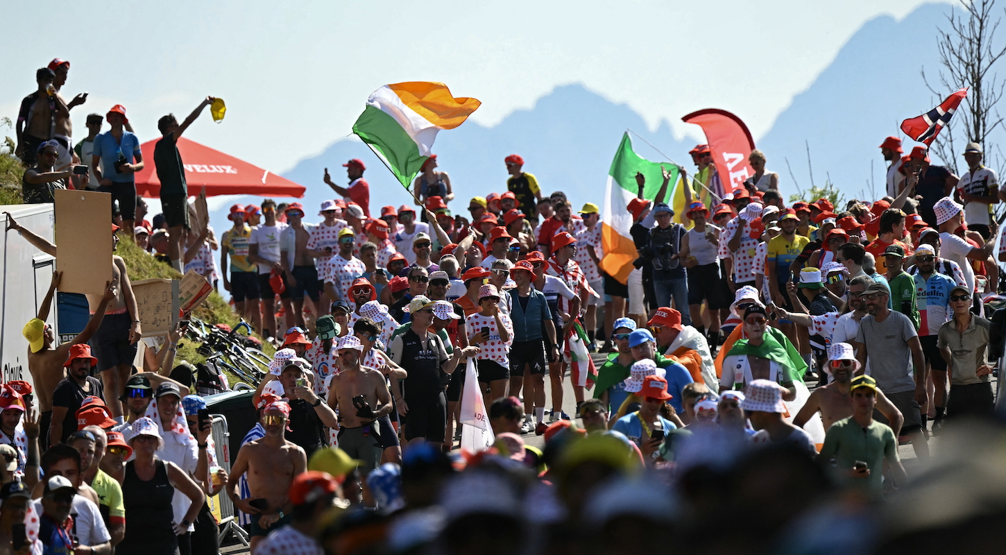 Spectators crowd the ascent of Hautacam during the 12th stage of the 112th edition of the Tour de France cycling race, 180.6 km between Auch and Hautacam, in the Pyrenees mountains of southwestern France, on July 17, 2025.