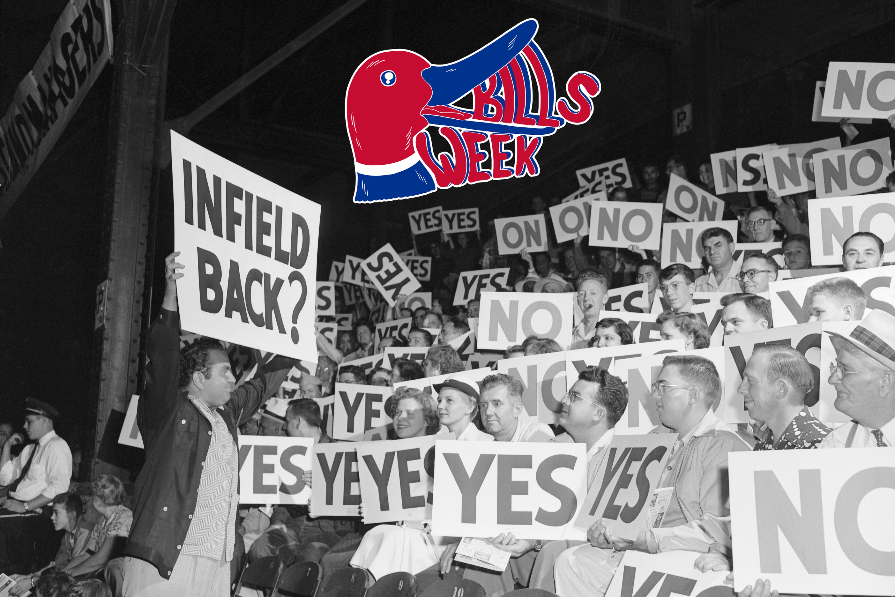 Bill Veeck holds up a sign to the crowd so they can manage the baseball game