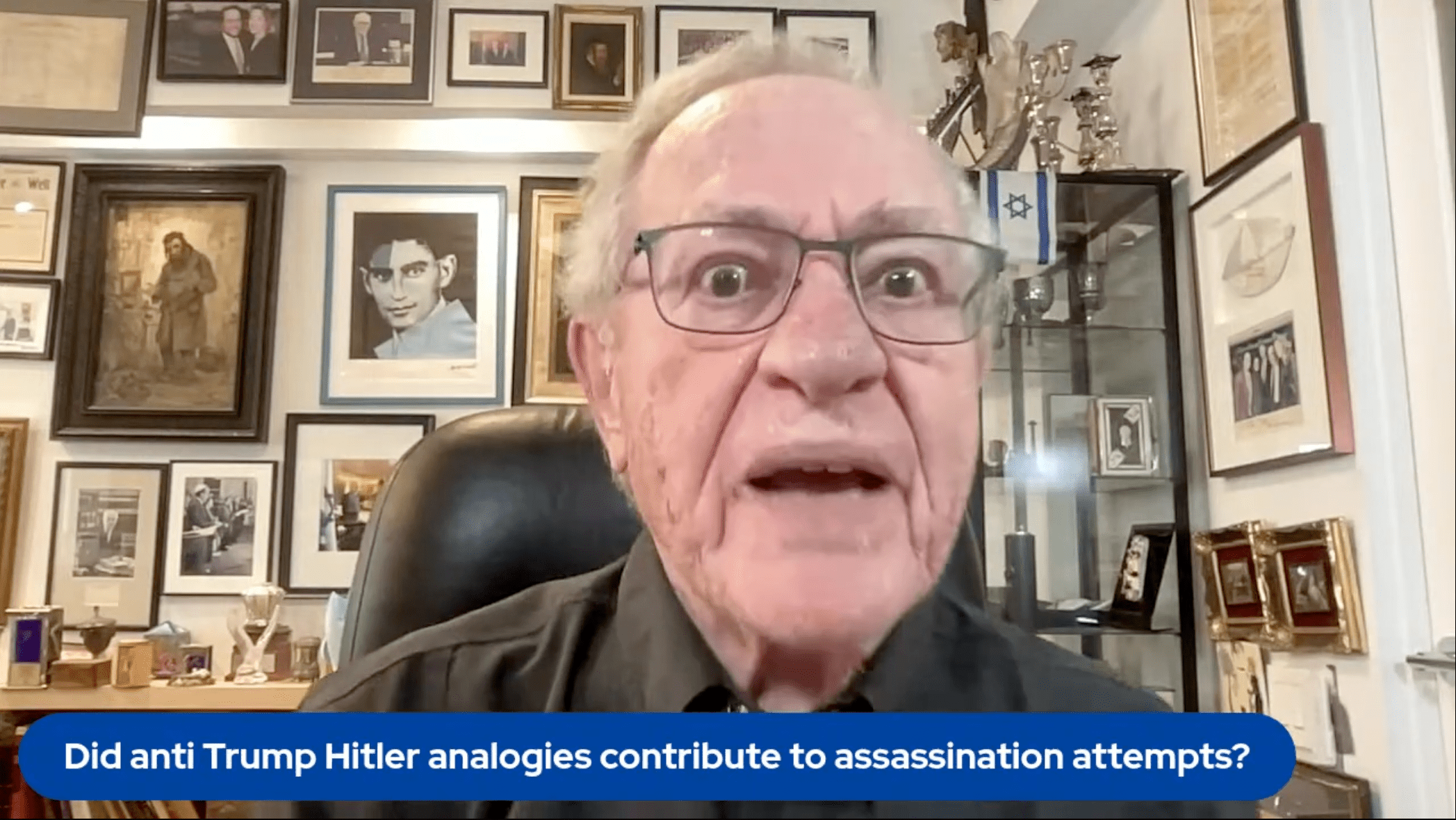 A screengrab of Alan Dershowitz on his Dershow podcast's mailbag segment. He is literally saying the words "Jeffrey Epstein" at this moment.