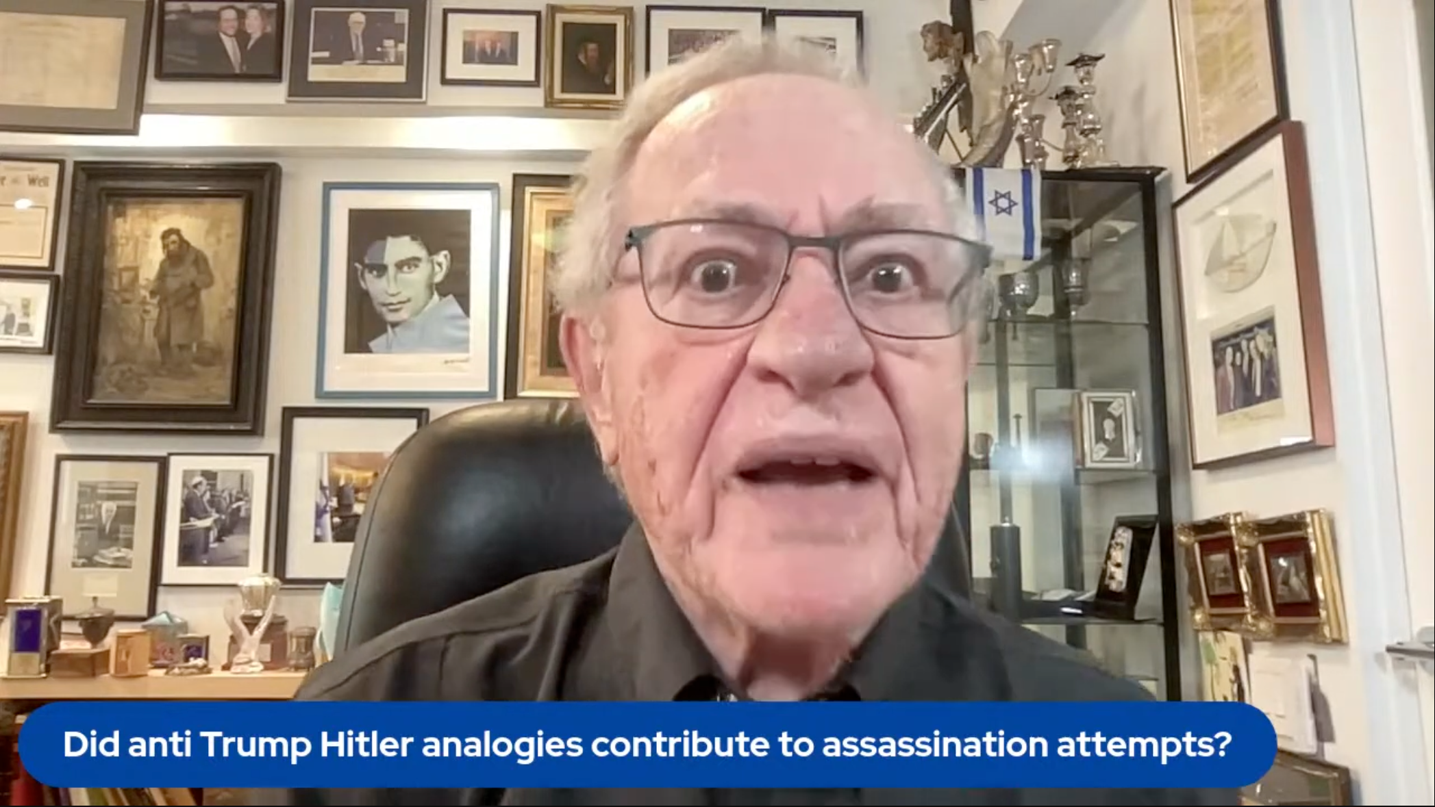 A screengrab of Alan Dershowitz on his Dershow podcast's mailbag segment. He is literally saying the words "Jeffrey Epstein" at this moment.