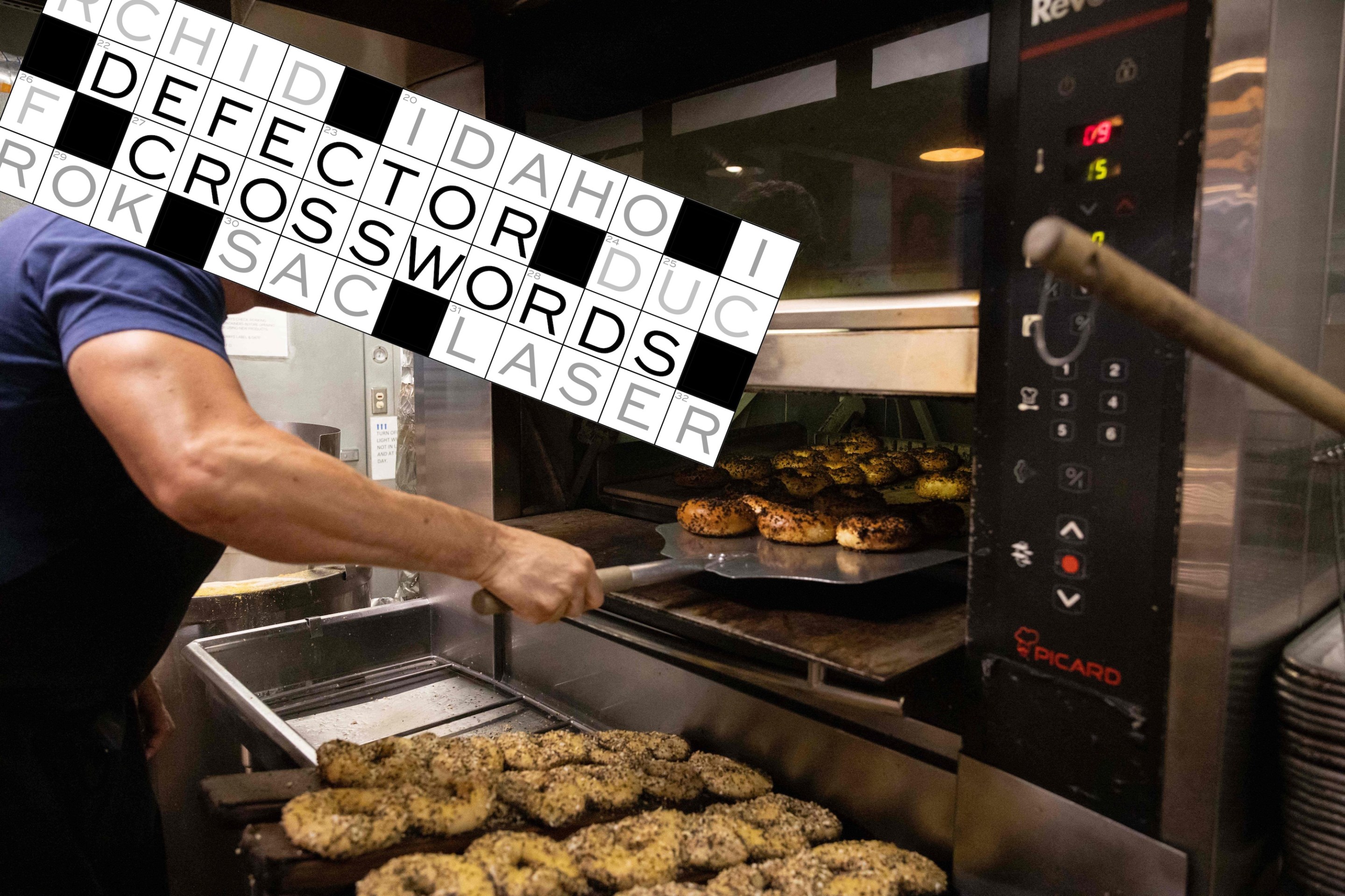 Andrew Martinez, owner of Bo's Bagels, bakes bagels in his store's oven on July 12, 2023 in New York City. Bagels are as synonymous with New York as pizza and the Statue of Liberty. Although there is no official count of New York's daily bagel production, Sam Silverman, chief executive of the trade group Bagelup, estimates there are about 500 specialty shops across the city's five boroughs. The ring-shaped bread has evolved and been reinvented since its arrival more than a century ago thanks to Polish Jewish immigrants.
