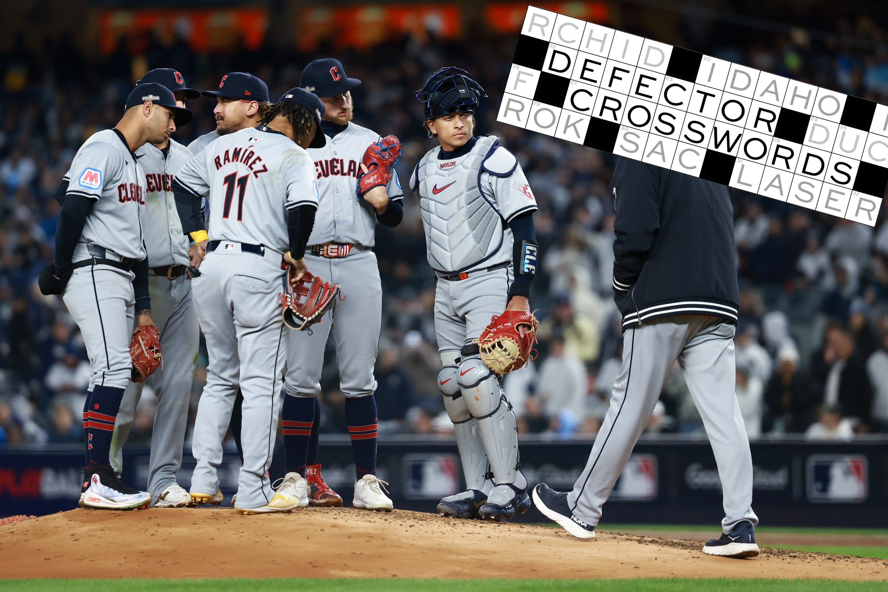 Pitching coach Carl Willis #51 of the Cleveland Guardians makes a mound visit in the second inning during Game 2 of the ALCS presented by loanDepot between the Cleveland Guardians and the New York Yankees at Yankee Stadium on Tuesday, October 15, 2024 in New York, New York.