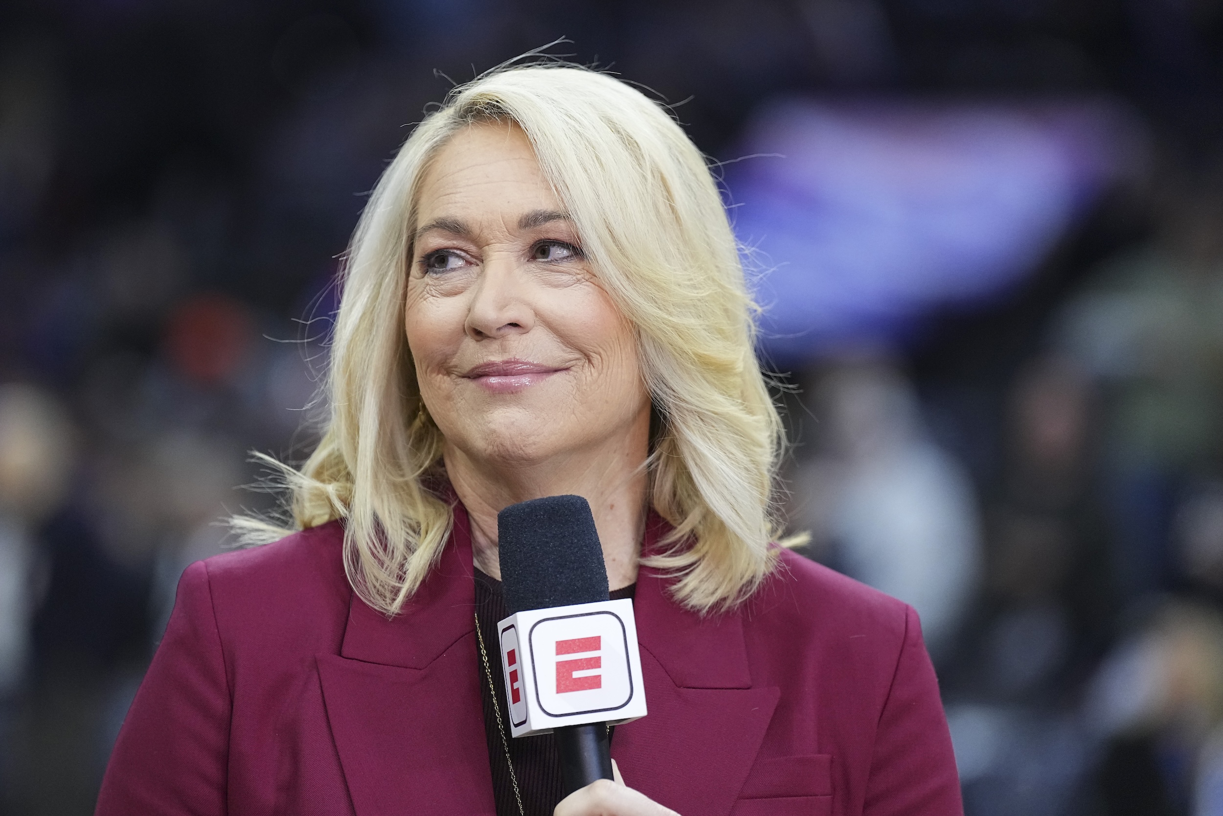 Doris Burke holds an ESPN microphone.