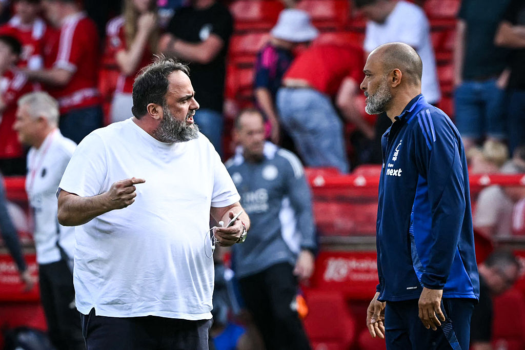 Nottingham Forest's Portuguese manager Nuno Espirito Santo (R) speaks with Nottingham Forest's Greek co-owner Evangelos Marinakis (L) at the end of the English Premier League football match between Nottingham Forest and Leicester City at The City Ground in Nottingham, central England, on May 11, 2025. Nottingham Forest and Leicester City equalise 2 - 2. (Photo by JUSTIN TALLIS / AFP) / RESTRICTED TO EDITORIAL USE. No use with unauthorized audio, video, data, fixture lists, club/league logos or 'live' services. Online in-match use limited to 120 images. An additional 40 images may be used in extra time. No video emulation. Social media in-match use limited to 120 images. An additional 40 images may be used in extra time. No use in betting publications, games or single club/league/player publications. /