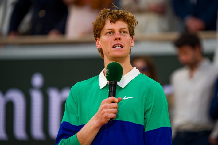 Jannik Sinner of Italy speaks at the trophy ceremony following his defeat to Carlos Alcaraz of Spain in the Men’s Singles Final match on Day Fifteen of the 2025 French Open at Roland Garros on June 08, 2025 in Paris, France.