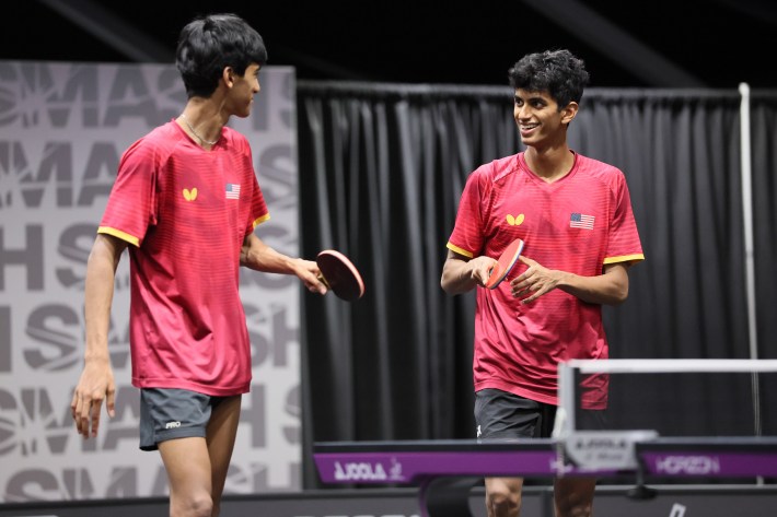 Sid Naresh and Nandan Naresh of the United States react in the Men's Doubles Round of 16 match against Lin Shidong and Huang Youzheng of China on day 4 of the United States Smash 2025 World Table Tennis at the Orleans Arena on July 9, 2025 in Las Vegas, Nevada.