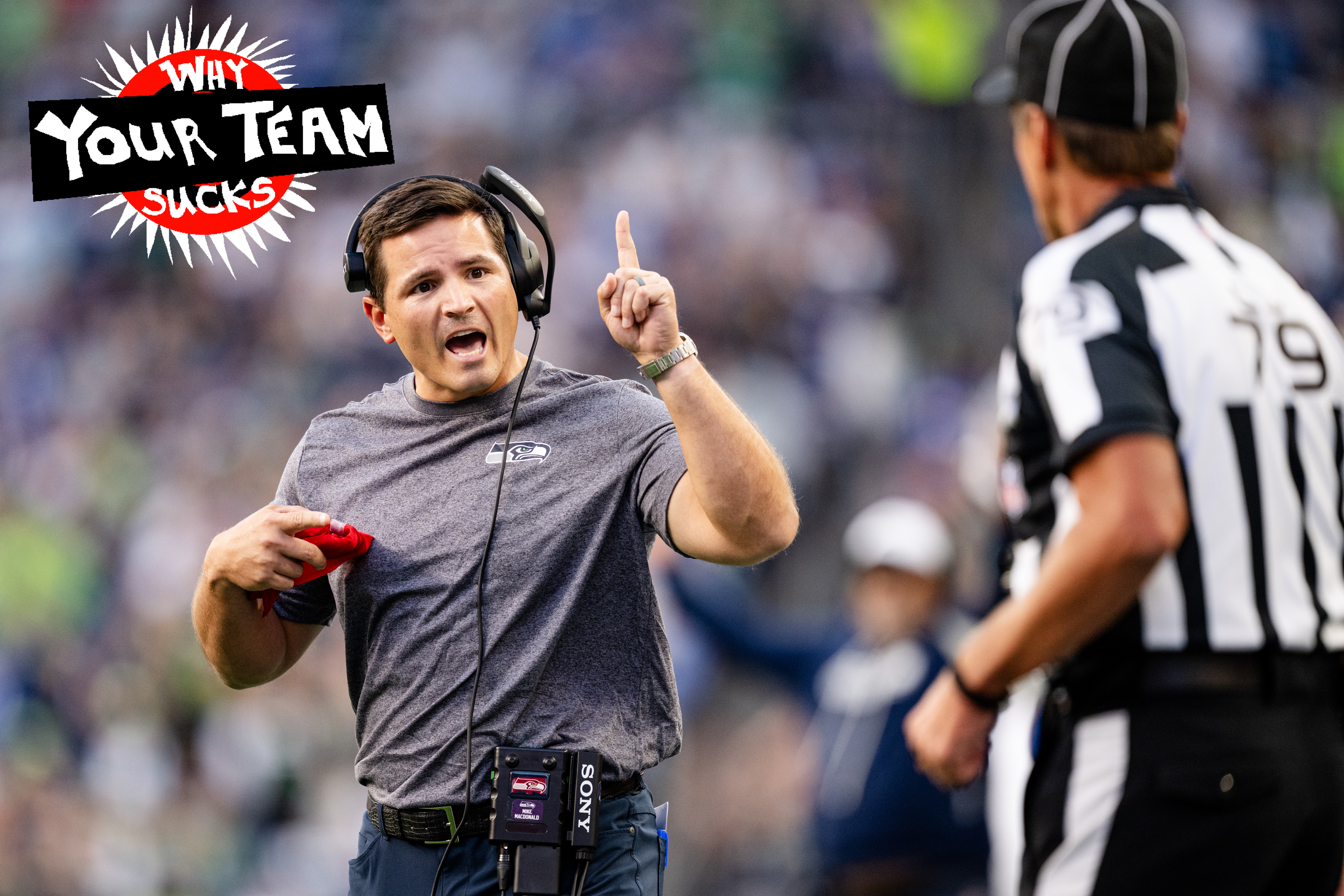 Head Coach Mike Macdonald of the Seattle Seahawks challenges the referee during the first quarter of a game