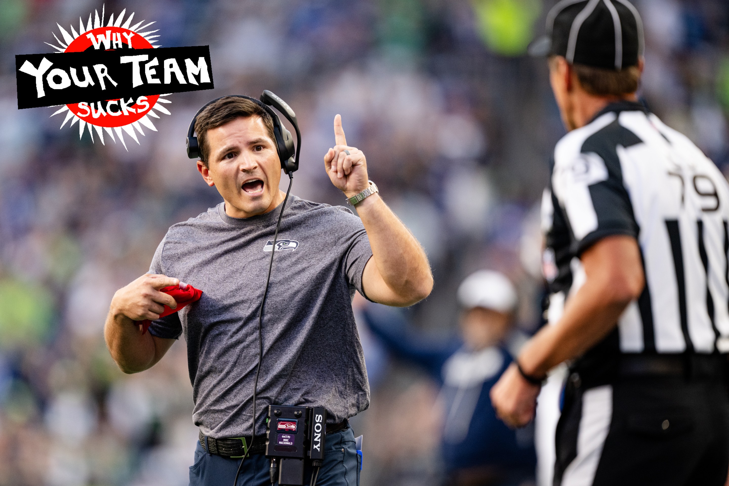 Head Coach Mike Macdonald of the Seattle Seahawks challenges the referee during the first quarter of a game