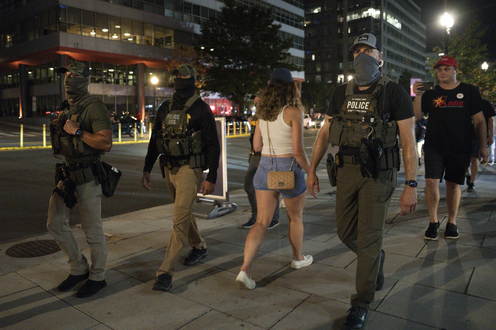 The Diplomatic Security Service (DSS), Federal Bureau of Investigation (FBI), Homeland Security Investigations (HSI), Metropolitan Police Department (MPD), and Metro Transit Police Department (MTPD) agents walk on patrol near Nationals Park on August 15, 2025 in Washington, DC. An increased presence of law enforcement has been seen throughout the nation's capital since U.S. President Donald Trump announced plans to deploy federal officers and the U.S. National Guard.