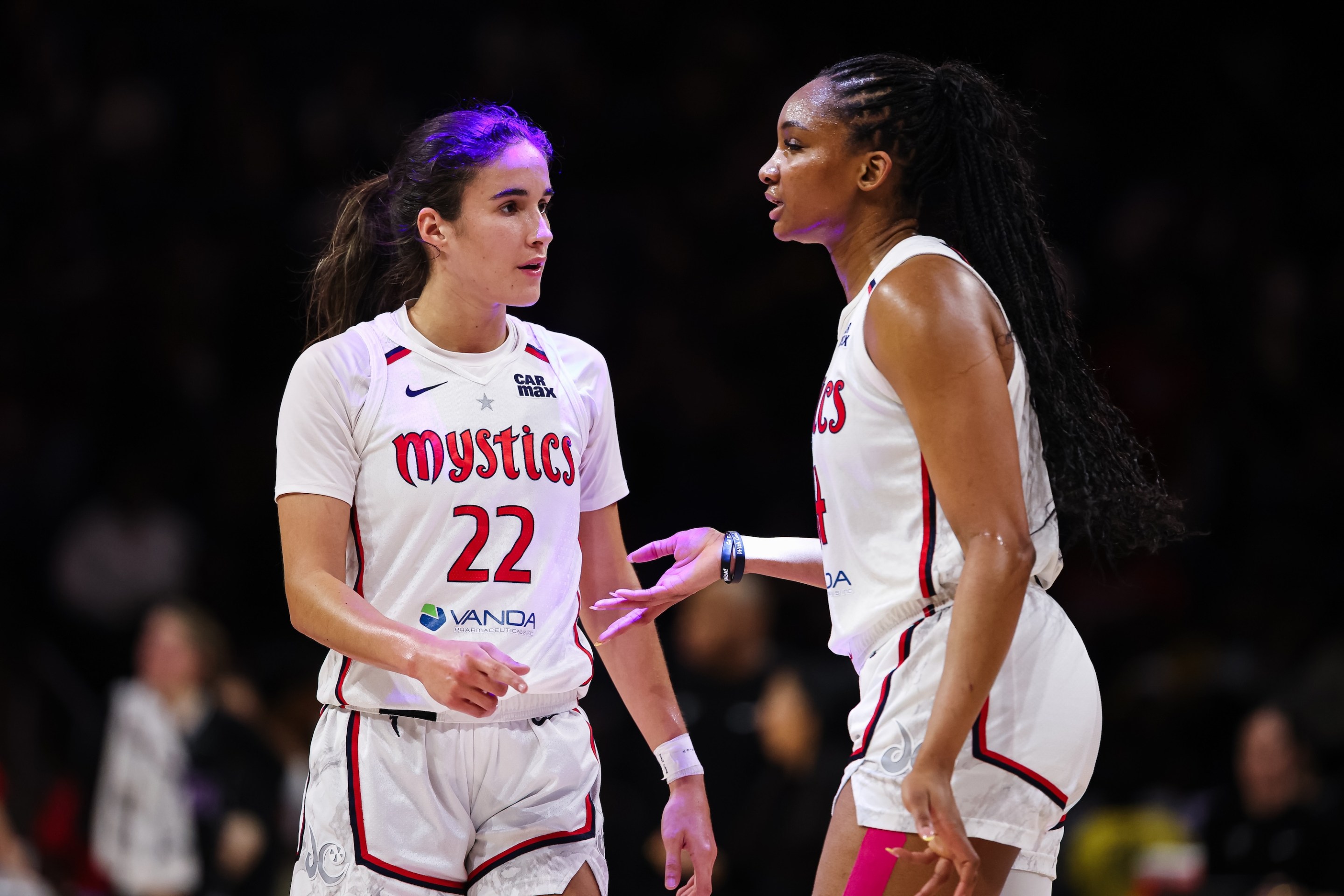 Sonia Citron #22 and Kiki Iriafen #44 of the Washington Mystics interact during the first half of the game against the Golden State Valkyries at CareFirst Arena on July 31, 2025 in Washington, DC.