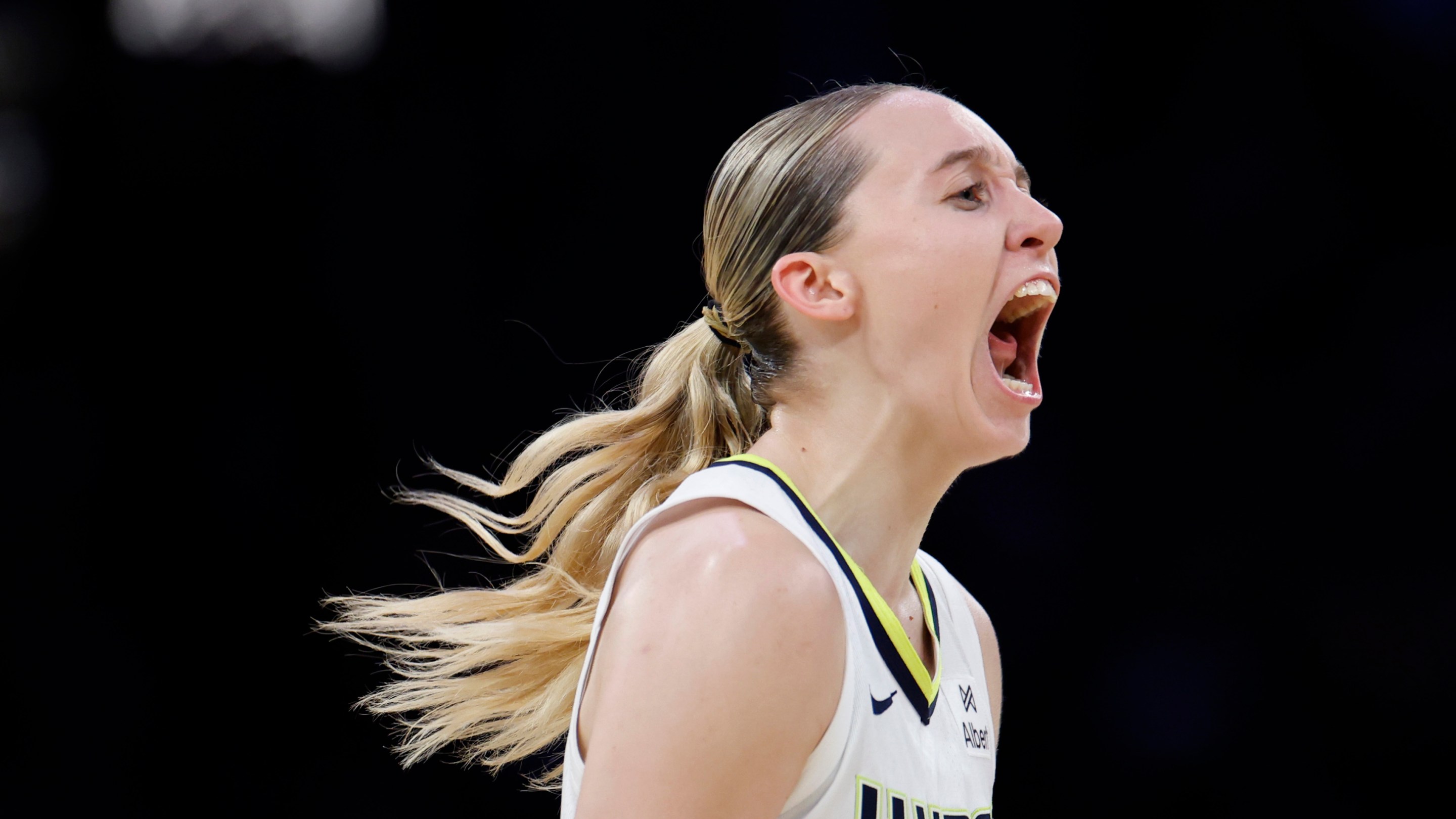 Paige Bueckers #5 of the Dallas Wings celebrates reacts to a Wings three pointer during an 81-80 Los Angeles Sparks win over the Dallas Wings at Crypto.com Arena on August 20, 2025 in Los Angeles, California.