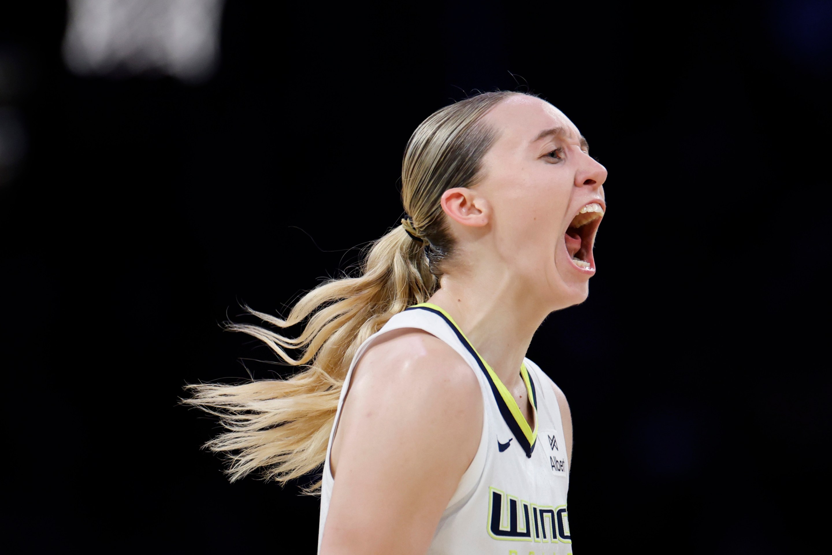 Paige Bueckers #5 of the Dallas Wings celebrates reacts to a Wings three pointer during an 81-80 Los Angeles Sparks win over the Dallas Wings at Crypto.com Arena on August 20, 2025 in Los Angeles, California.