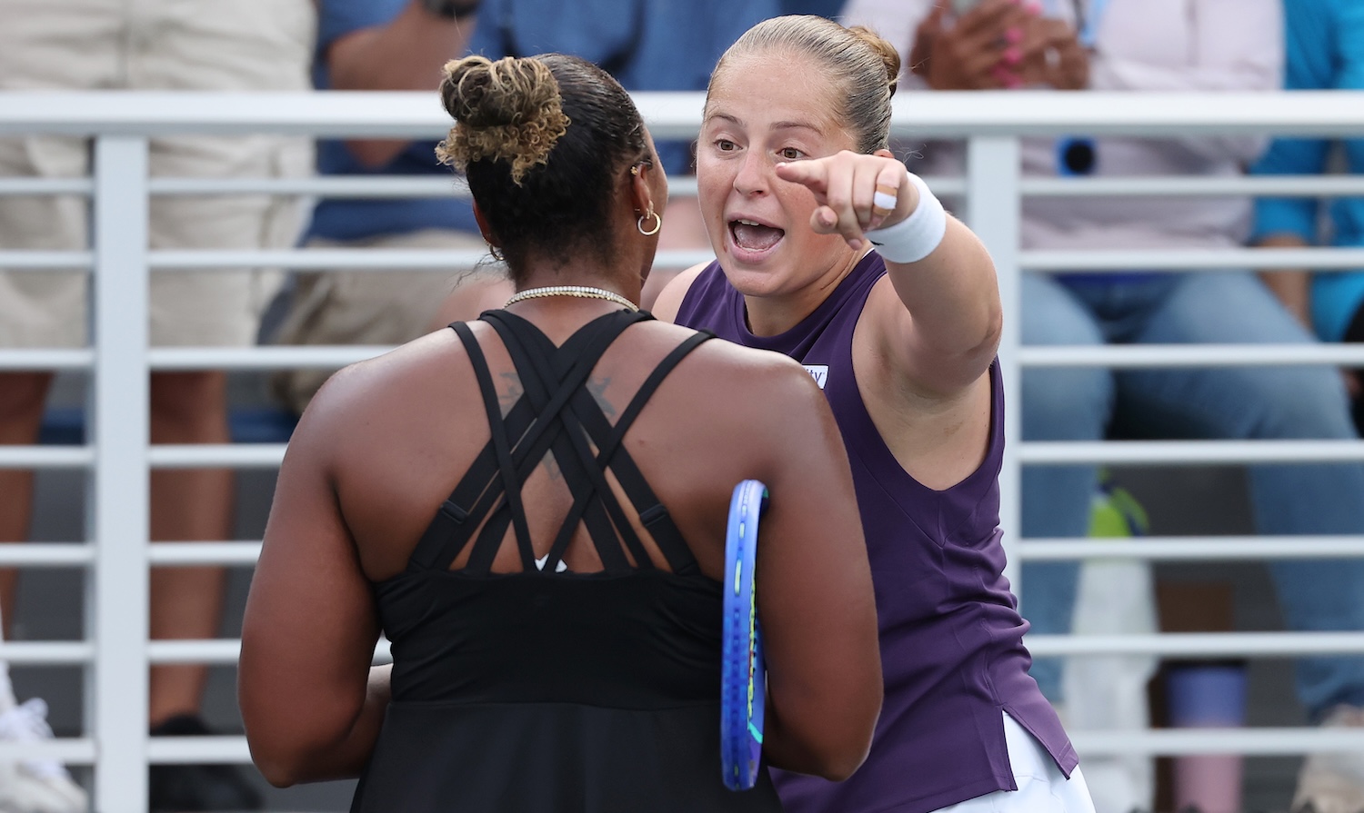 NEW YORK, NEW YORK - AUGUST 27: Jelena Ostapenko of Latvia (R) argues with Taylor Townsend of the United States (L) following their Women's Singles Second Round match on Day Four of the 2025 US Open at USTA Billie Jean King National Tennis Center on August 27, 2025 in the Flushing neighborhood of the Queens borough of New York City. (Photo by Clive Brunskill/Getty Images)