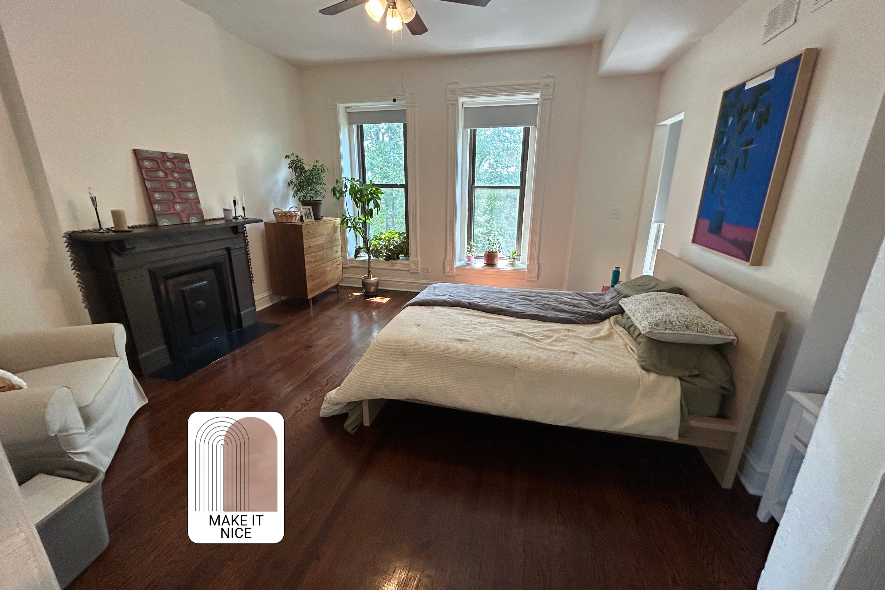 A large bedroom with spare furniture