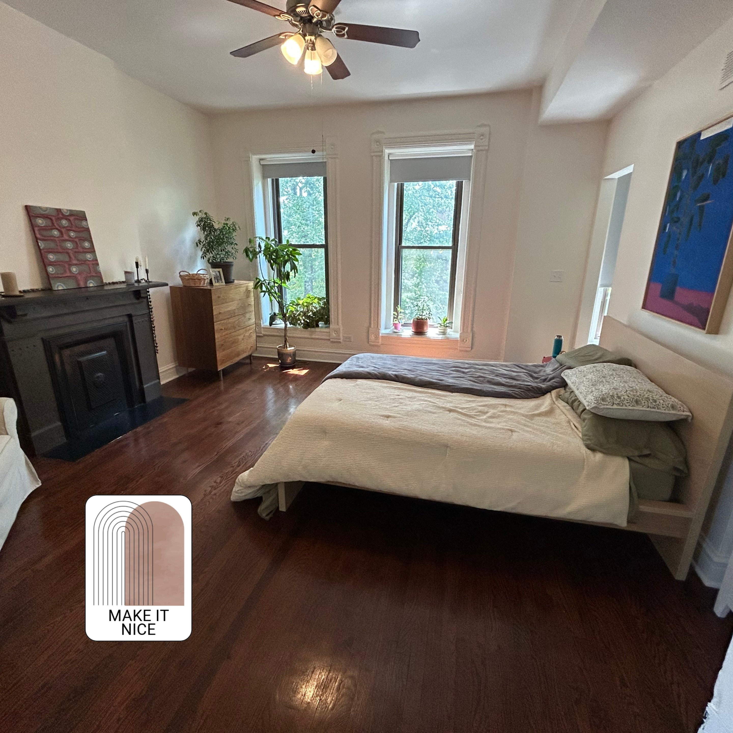 A large bedroom with spare furniture