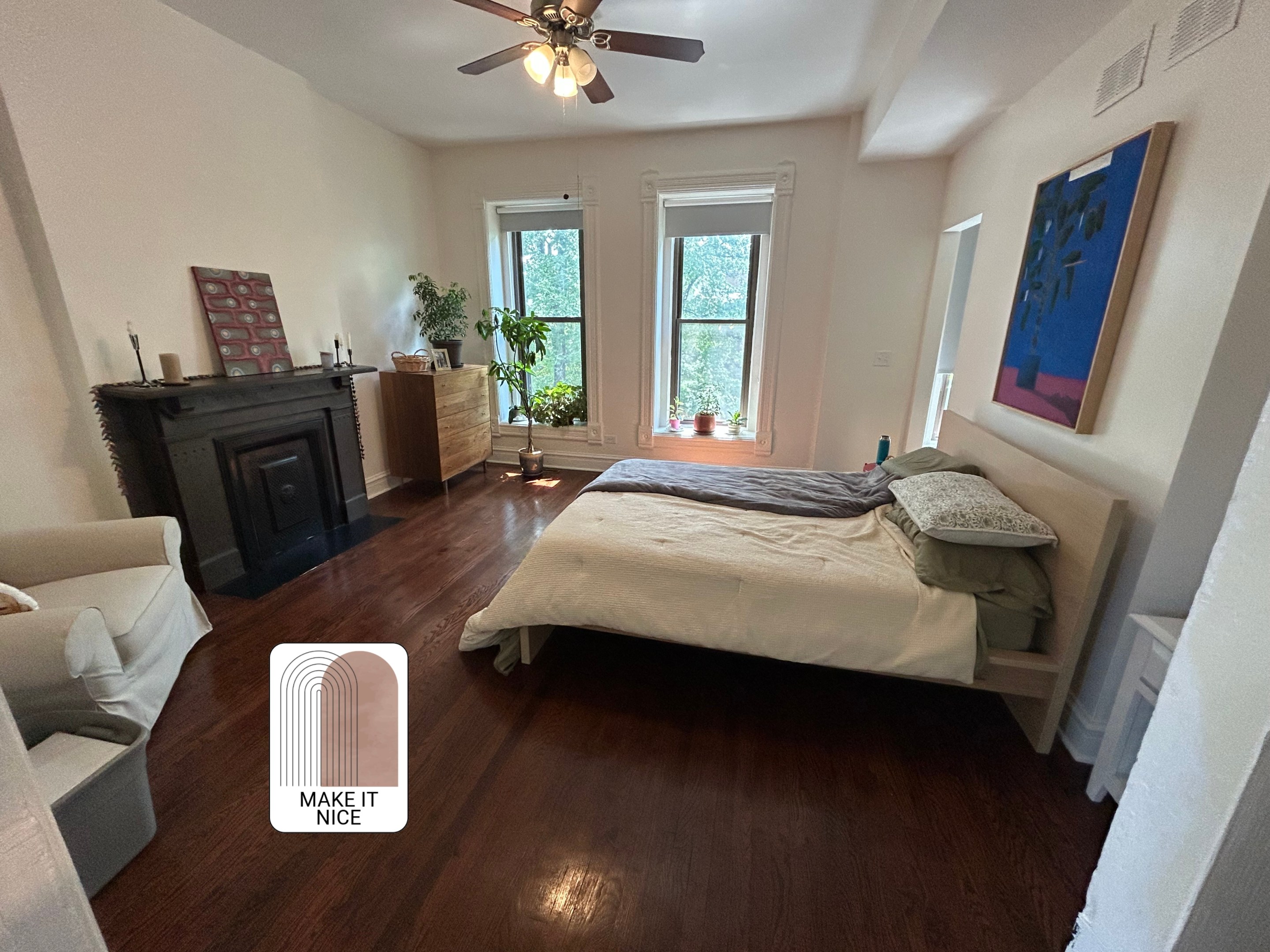 A large bedroom with spare furniture