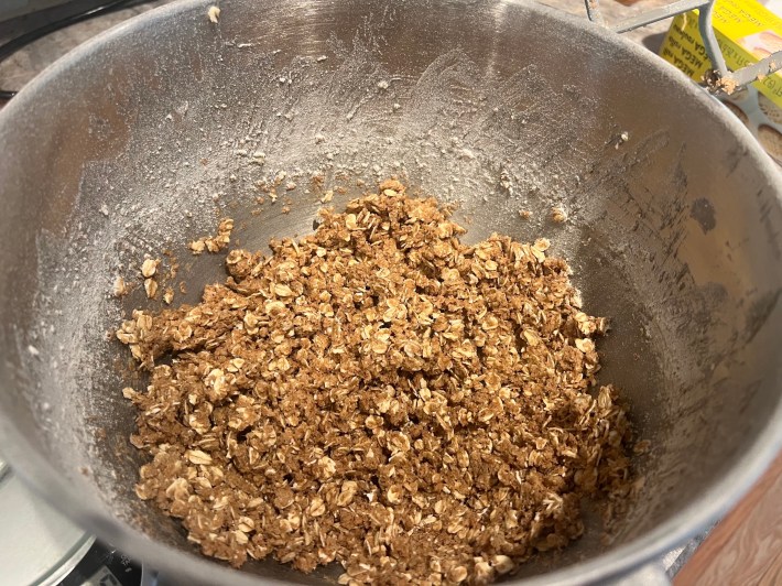 Crumbly cookie dough, in a metal bowl