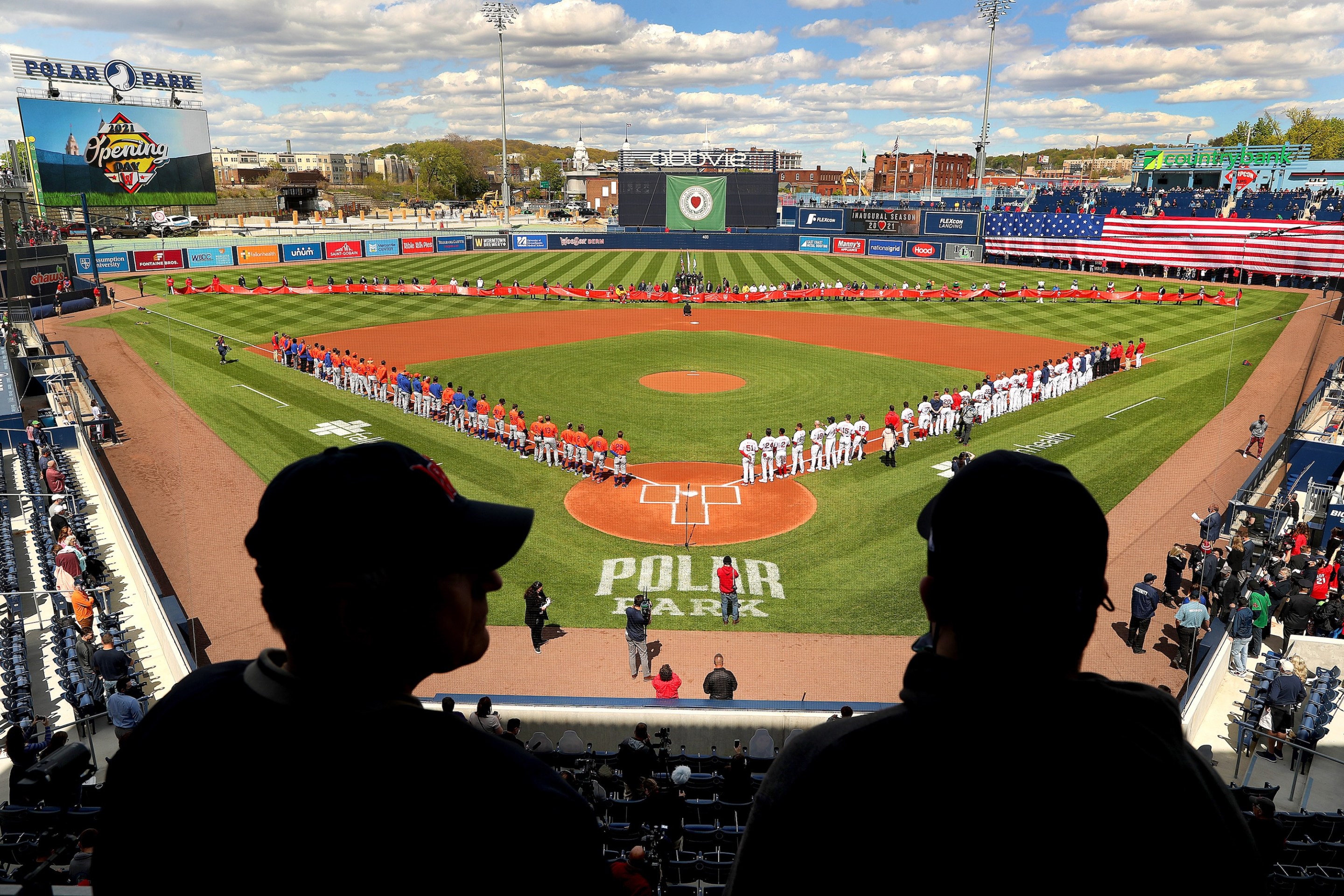 Worcester, MA - May 11: Opening Day at the new Polar Park for the Worcester Red Sox in Worcester on May 11, 2021. Spectators watch from above home plate as Syracuse Mets and the WooSox line the field. (Photo by John Tlumacki/The Boston Globe via Getty Images)
