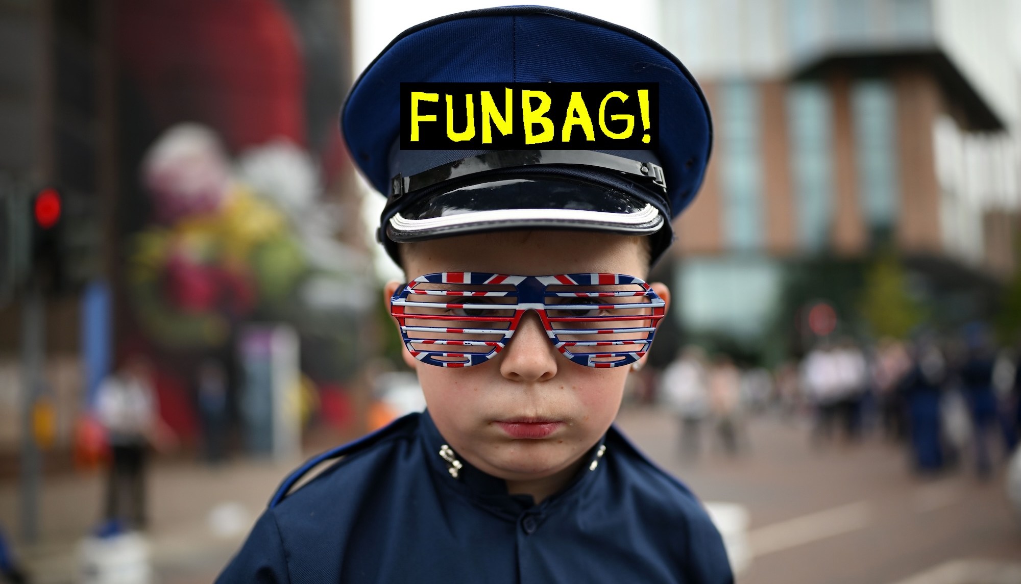 BELFAST, NORTHERN IRELAND - JULY 12: A young band member is seen wearing Union Jack sunglasses as Orangemen and band members take part in the annual Twelfth of July parade on July 12, 2024 in Belfast, United Kingdom. The Twelfth of July, also known as "The Twelfth" or "Orangemen's Day," is celebrated in Northern Ireland to commemorate King William's victory over Catholic King James II at the Battle of the Boyne 334 years ago. The day features parades, bonfires, wreath-laying ceremonies, and performances. The Belfast parade attracts tens of thousands of spectators each year and is part of broader celebrations with demonstrations hosted in 18 locations across Northern Ireland, including Bangor, Ballymena, Carrickfergus, Newtownards, and Derry?. (Photo by Charles McQuillan/Getty Images)