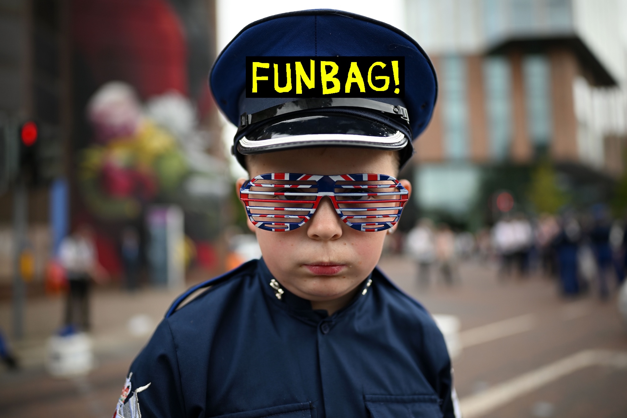 BELFAST, NORTHERN IRELAND - JULY 12: A young band member is seen wearing Union Jack sunglasses as Orangemen and band members take part in the annual Twelfth of July parade on July 12, 2024 in Belfast, United Kingdom. The Twelfth of July, also known as "The Twelfth" or "Orangemen's Day," is celebrated in Northern Ireland to commemorate King William's victory over Catholic King James II at the Battle of the Boyne 334 years ago. The day features parades, bonfires, wreath-laying ceremonies, and performances. The Belfast parade attracts tens of thousands of spectators each year and is part of broader celebrations with demonstrations hosted in 18 locations across Northern Ireland, including Bangor, Ballymena, Carrickfergus, Newtownards, and Derry?. (Photo by Charles McQuillan/Getty Images)