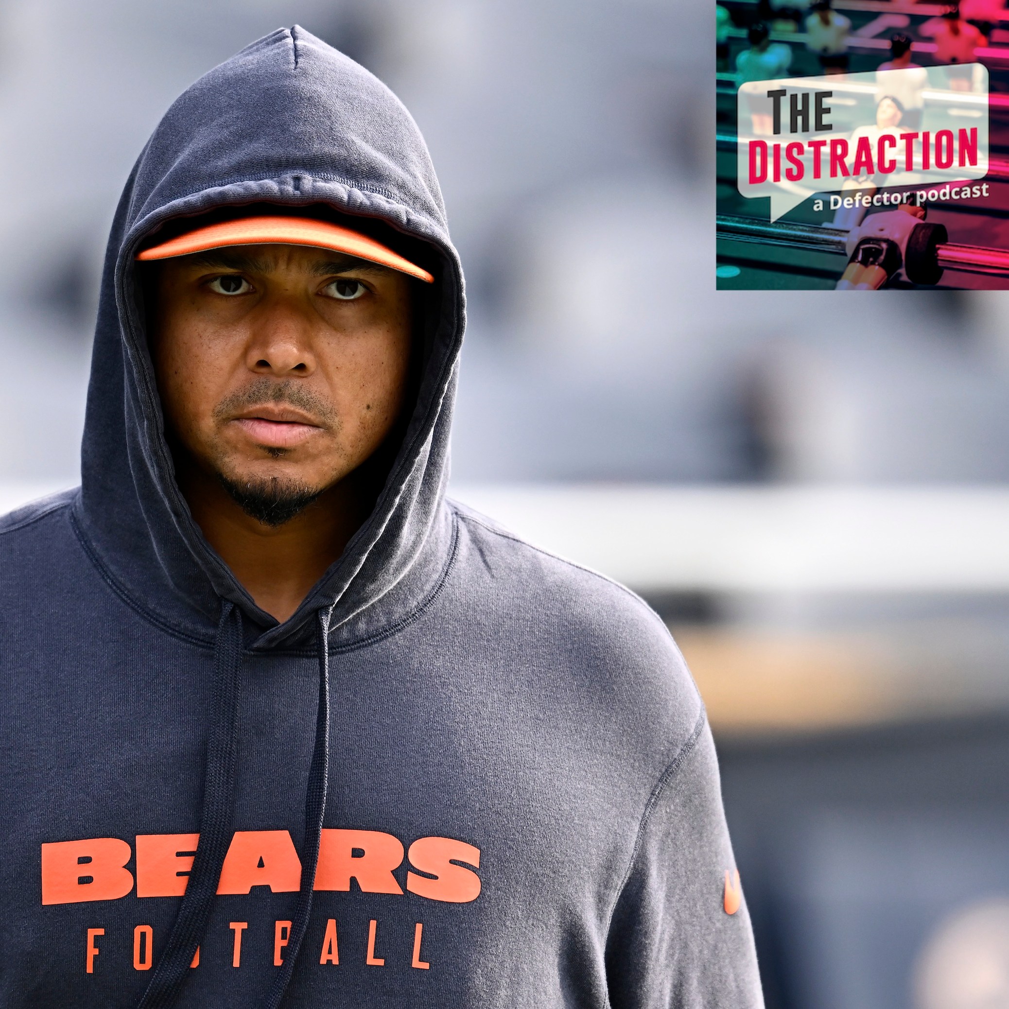 General manager Ryan Poles of the Chicago Bears looks on prior to a game against the Green Bay Packers at Soldier Field on November 17, 2024. He is scowling under a hoodie.