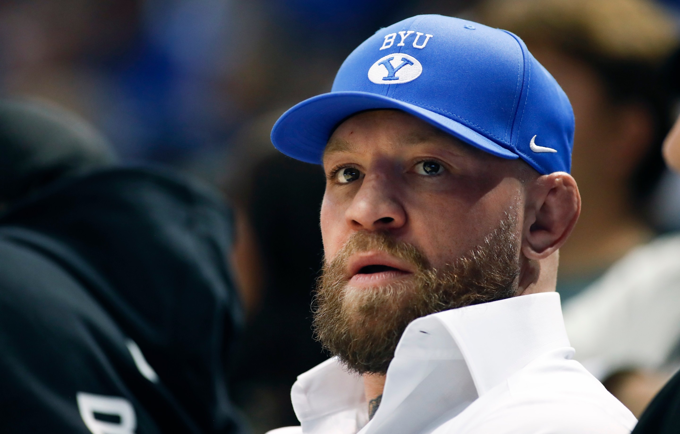 PROVO, UT - JANUARY 28: Boxer Conor McGregor sports a Brigham Young hat during the second half of the Brigham Young Cougars game agaisnt the Baylor Bears at the Marriott Center on January 28, 2025 in Provo, Utah. (Photo by Chris Gardner/Getty Images)