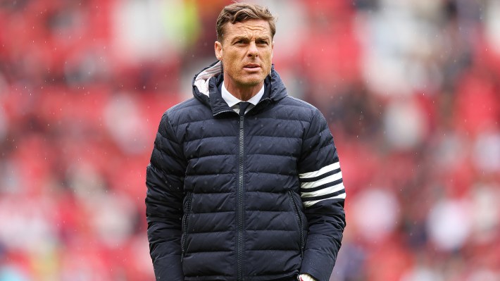 Scott Parker, Manager of Burnley, looks on prior to the Premier League match between Manchester United and Burnley at Old Trafford on August 30, 2025 in Manchester, England.