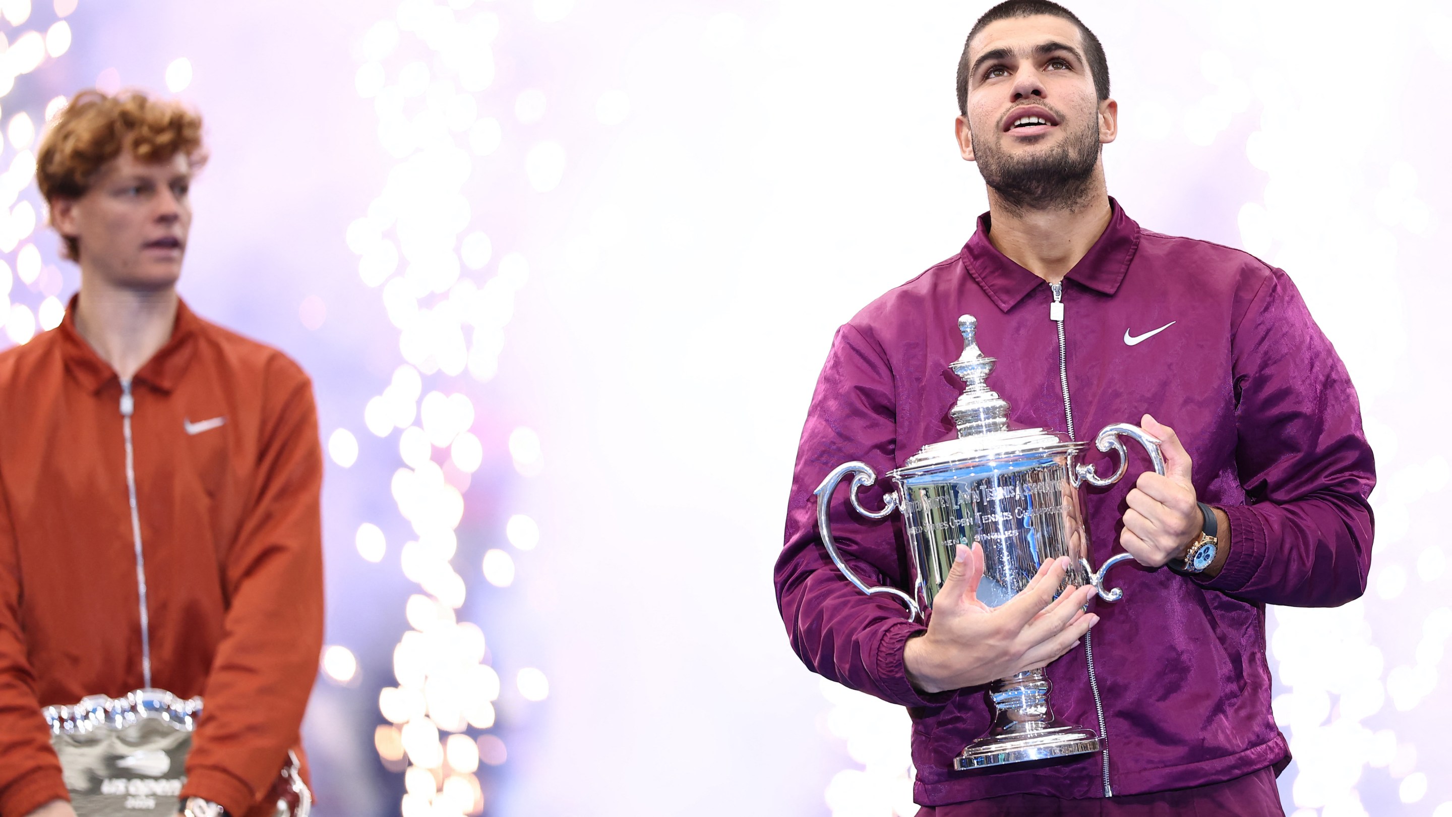 Spain's Carlos Alcaraz poses with his trophy after winning the men's singles final tennis match against Italy's Jannik Sinner