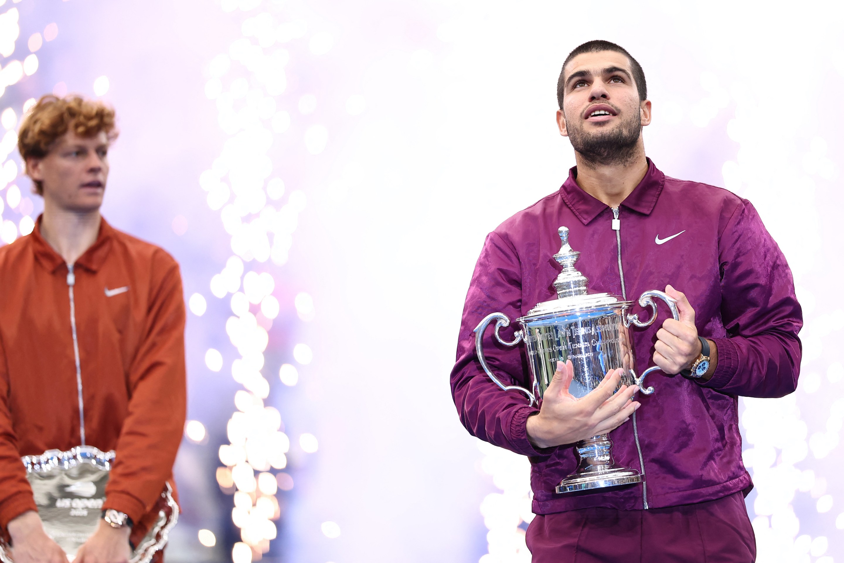 Spain's Carlos Alcaraz poses with his trophy after winning the men's singles final tennis match against Italy's Jannik Sinner