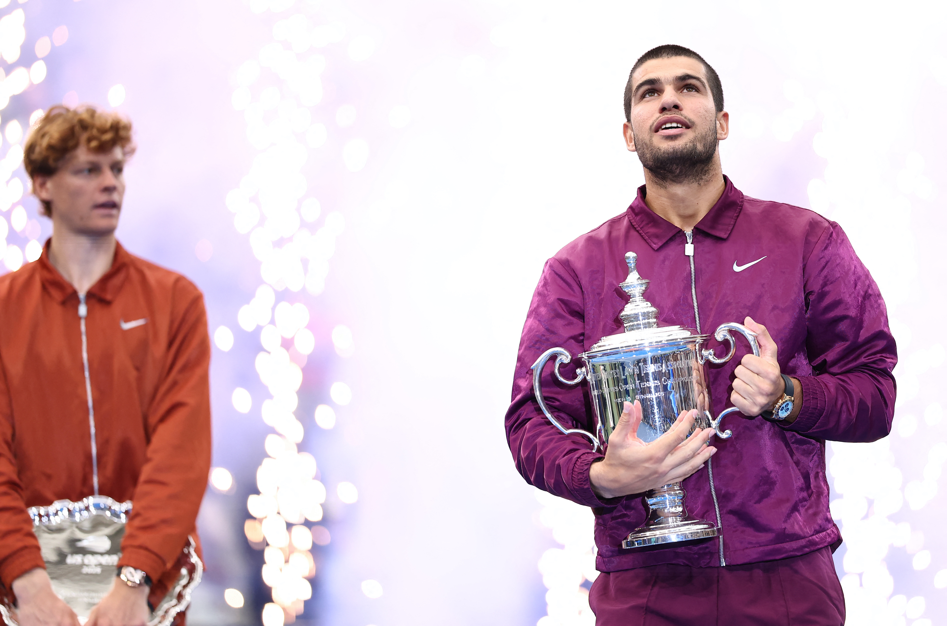 Spain's Carlos Alcaraz poses with his trophy after winning the men's singles final tennis match against Italy's Jannik Sinner