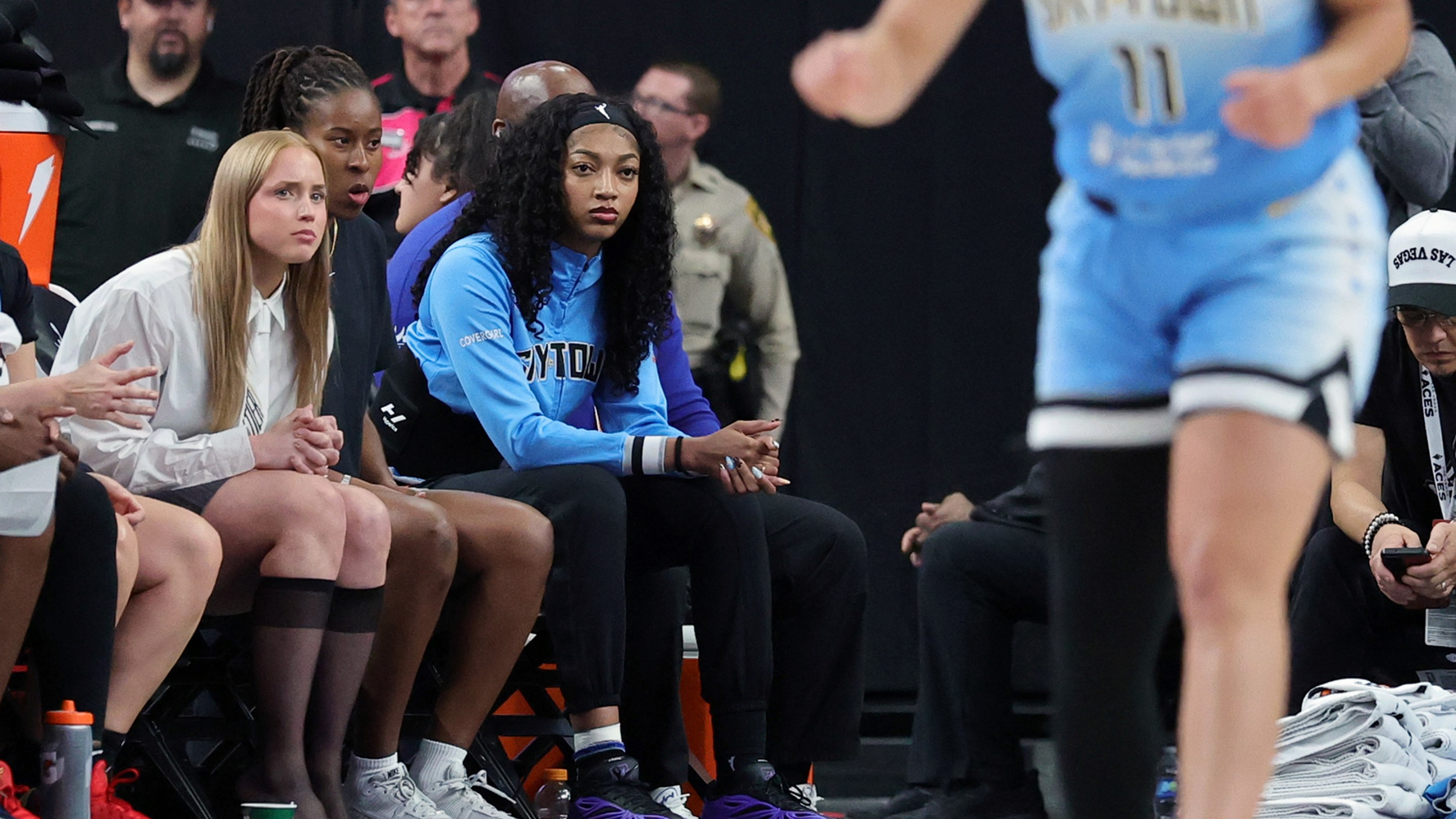 Hailey Van Lith #2, Ariel Atkins #7 and Angel Reese #5 of the Chicago Sky look on from the bench in the third quarter of their game against the Las Vegas Aces at T-Mobile Arena on September 07, 2025 in Las Vegas, Nevada. The Aces defeated the Sky 80-66.