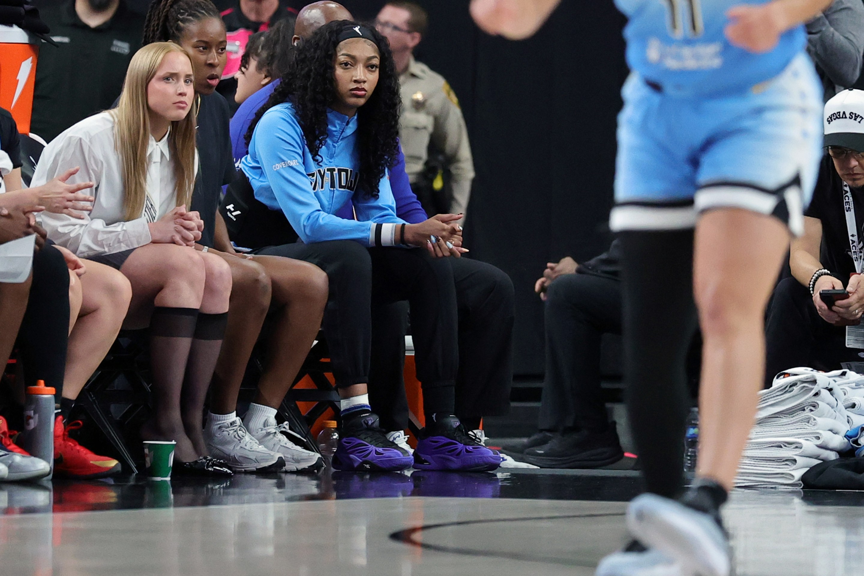Hailey Van Lith #2, Ariel Atkins #7 and Angel Reese #5 of the Chicago Sky look on from the bench in the third quarter of their game against the Las Vegas Aces at T-Mobile Arena on September 07, 2025 in Las Vegas, Nevada. The Aces defeated the Sky 80-66.