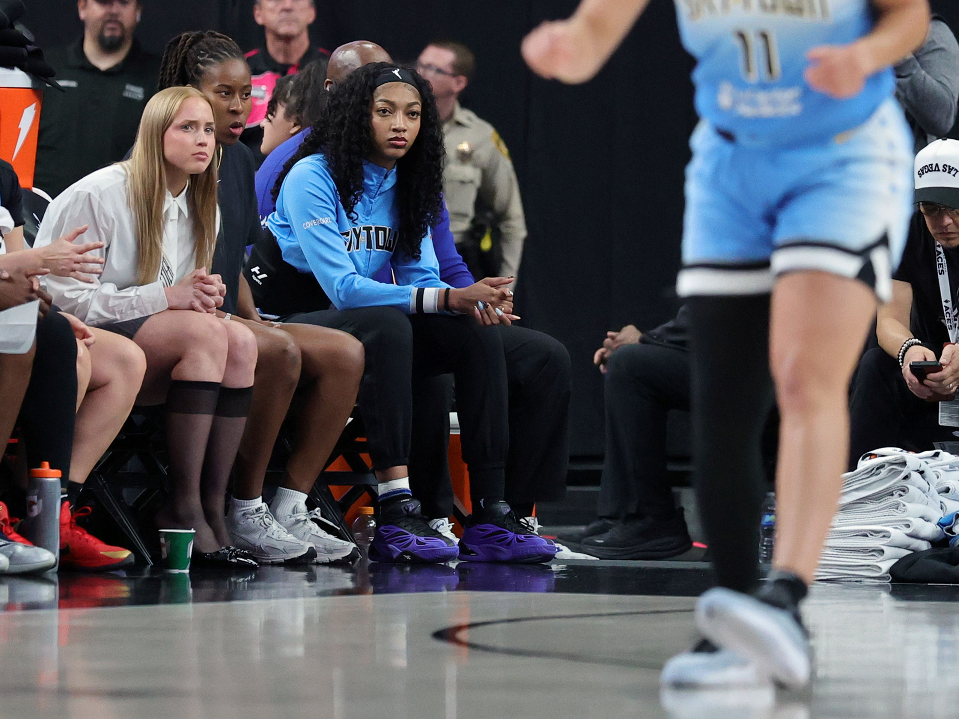Hailey Van Lith #2, Ariel Atkins #7 and Angel Reese #5 of the Chicago Sky look on from the bench in the third quarter of their game against the Las Vegas Aces at T-Mobile Arena on September 07, 2025 in Las Vegas, Nevada. The Aces defeated the Sky 80-66.