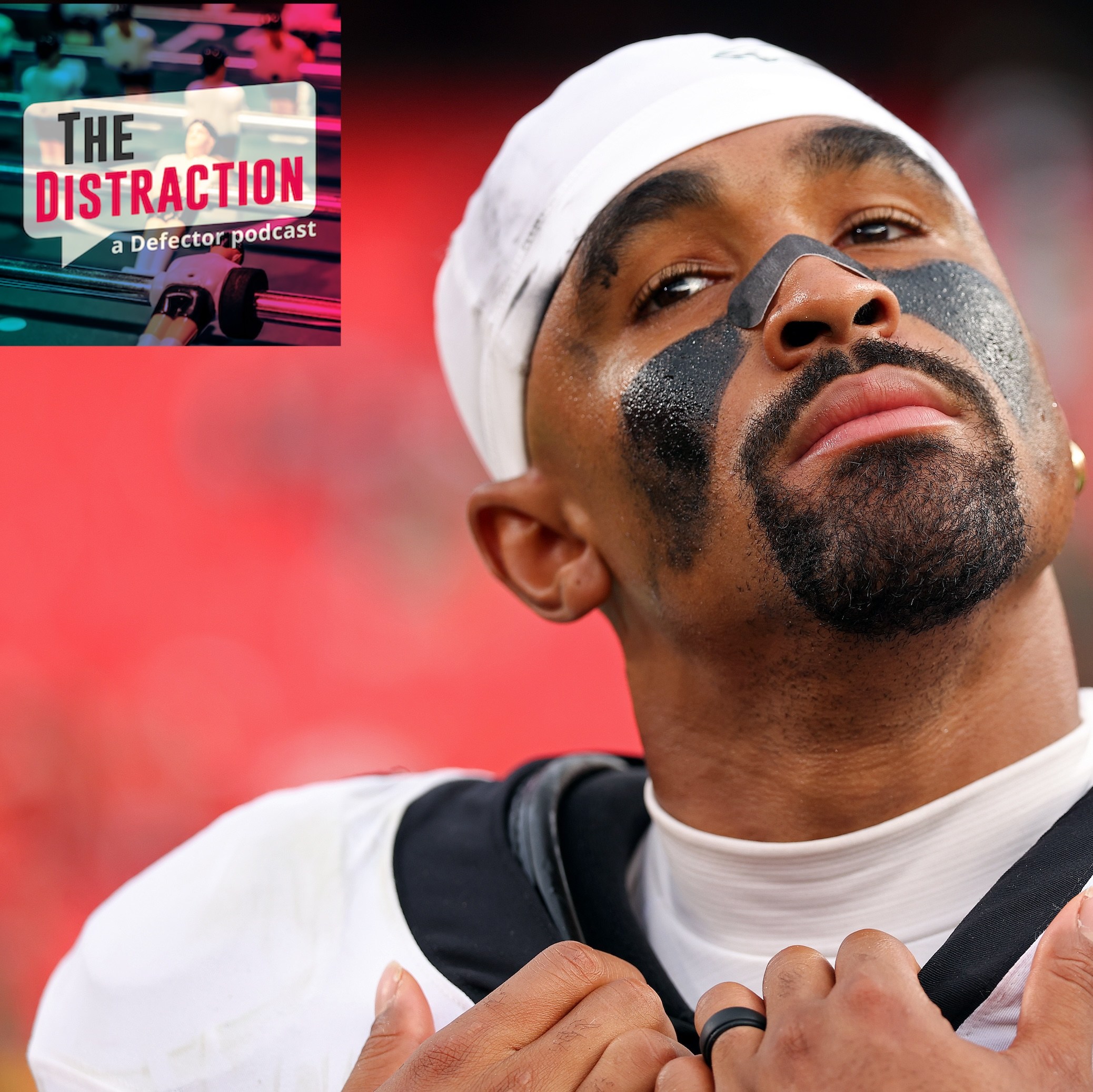 Jalen Hurts looking thoughtful after defeating the Kansas City Chiefs in the game at Arrowhead Stadium on September 14, 2025 in Kansas City. The Distraction logo is at upper left.