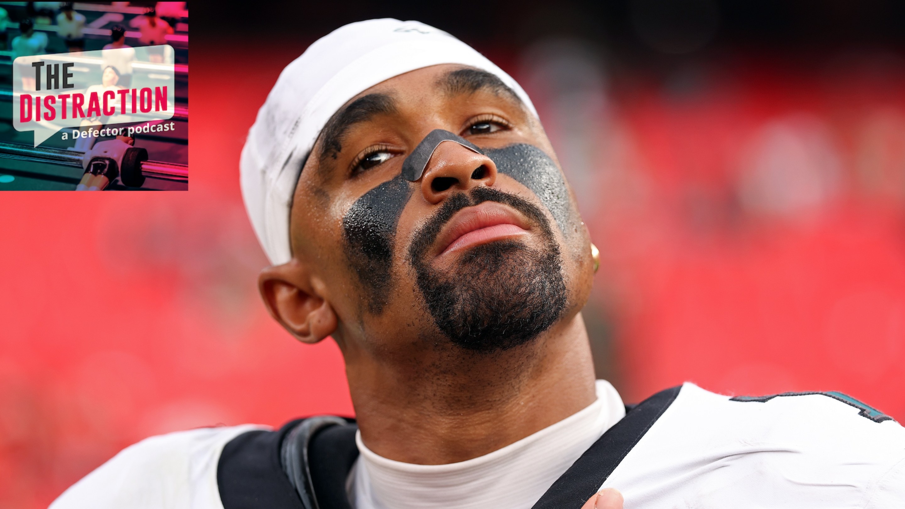 Jalen Hurts looking thoughtful after defeating the Kansas City Chiefs in the game at Arrowhead Stadium on September 14, 2025 in Kansas City. The Distraction logo is at upper left.