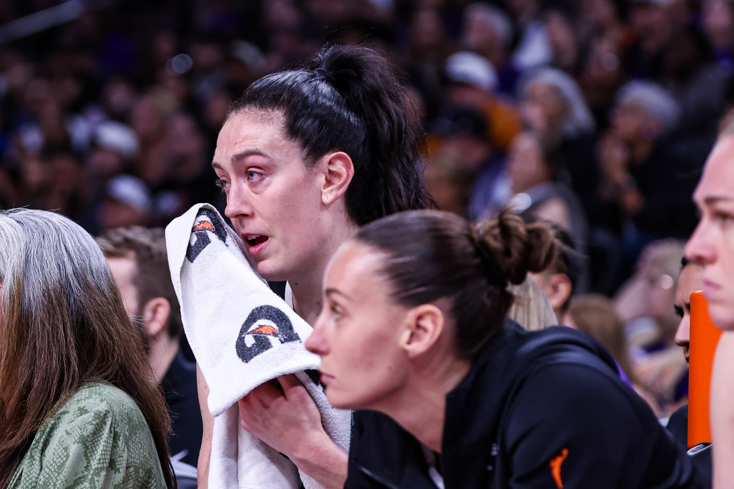 Breanna Stewart #30 of the New York Liberty cries on the bench after getting hurt during overtime against the Phoenix Mercury at PHX Arena on September 14, 2025 in Phoenix, Arizona.