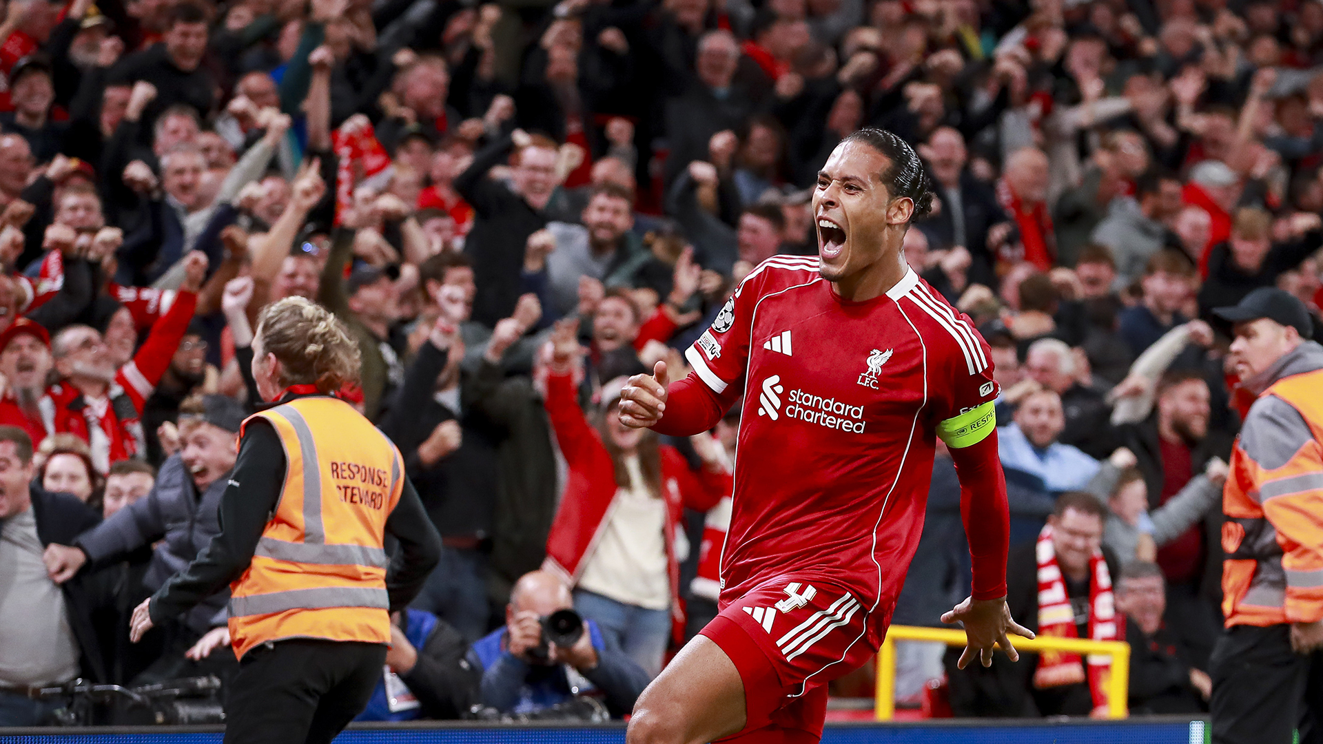 Virgil van Dijk of Liverpool FC celebrates after scoring his team's third goal during the UEFA Champions League 2025/26 League Phase MD1 match between Liverpool FC and Atletico de Madrid at Anfield on September 17, 2025 in Liverpool, England.
