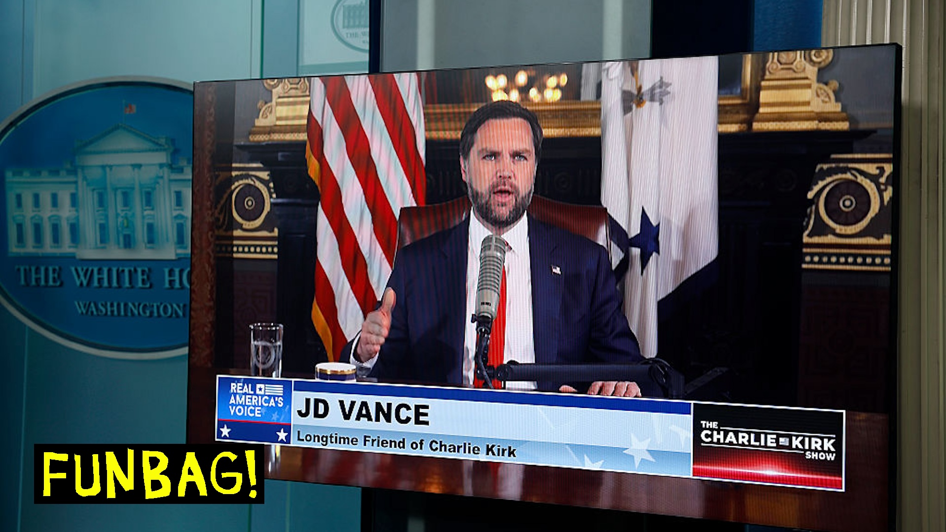 A video feed is displayed in the White House Briefing Room as U.S. Vice President JD Vance hosts a podcast episode of 'The Charlie Kirk Show' following the assassination of the show's namesake, at the White House on September 15, 2025 in Washington, DC. Tyler Robinson is accused of fatally shooting Charlie Kirk, CEO and co-founder of Turning Point USA, while he was speaking at an event for his "American Comeback Tour" on the campus of Utah Valley University.