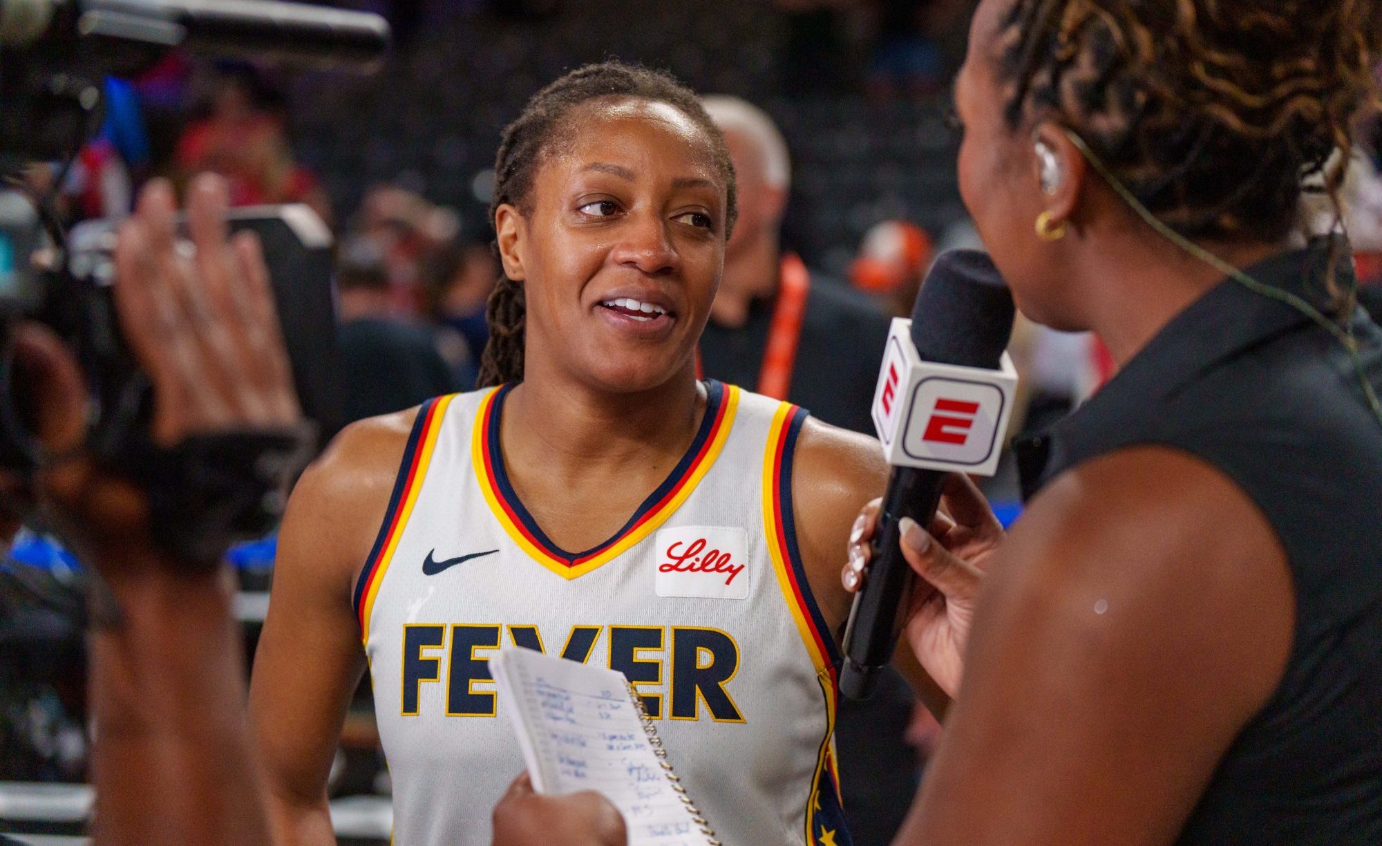 Kelsey Mitchell #0 of the Indiana Fever speaks with ESPN reporter after the game three of the first round of WNBA Playoffs between the Indiana Fever and Atlanta Dream at Gateway Center Arena on September 18, 2025 in College Park, Georgia.