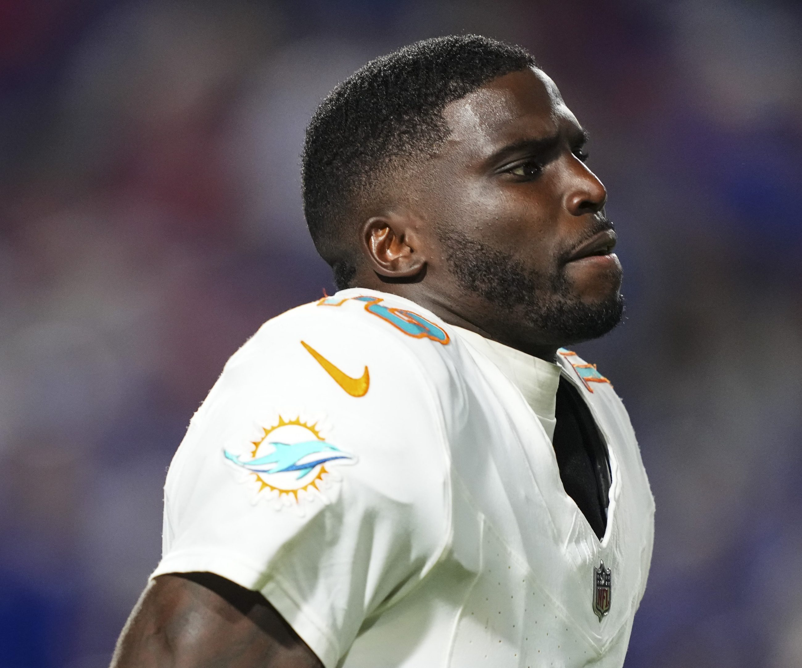 Tyreek Hill #10 of the Miami Dolphins runs across the field during an NFL football game against the Buffalo Bills at Highmark Stadium on September 18, 2025 in Orchard Park, New York.