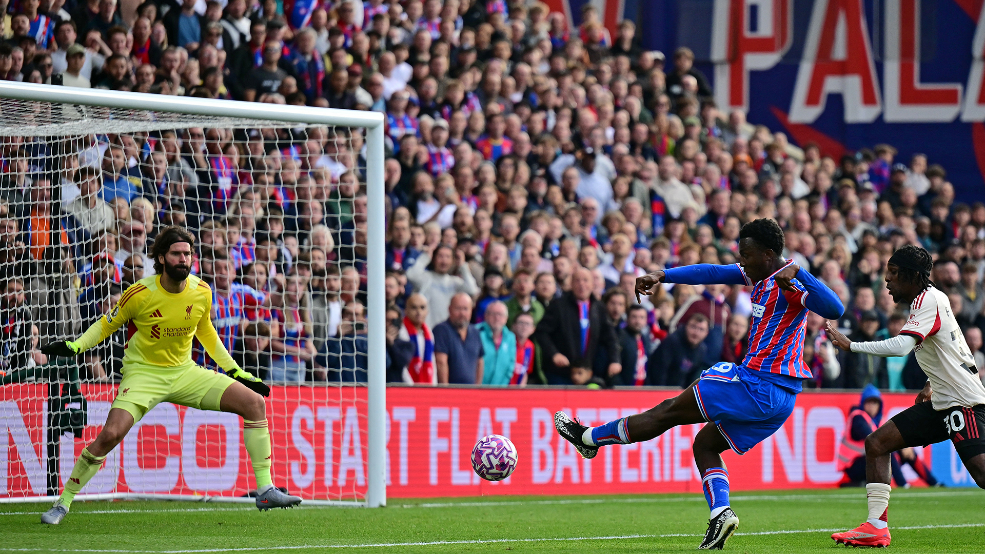 Crystal Palace's English striker #09 Eddie Nketiah shoots to score their late winner during the English Premier League football match between Crystal Palace and Liverpool at Selhurst Park in south London on September 27, 2025.