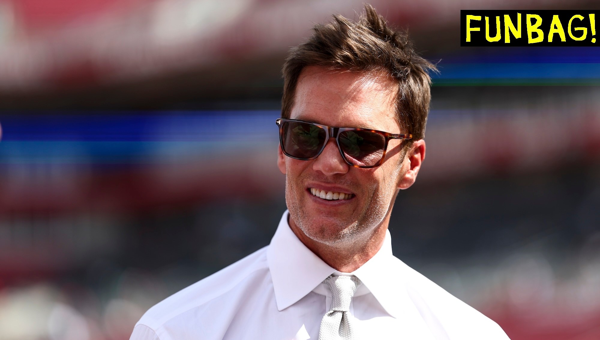 TAMPA, FLORIDA - SEPTEMBER 28: Fox Sports commentator and former NFL quarterback Tom Brady smiles prior to an NFL football game between the Tampa Bay Buccaneers and the Philadelphia Eagles at Raymond James Stadium on September 28, 2025 in Tampa, Florida. (Photo by Kevin Sabitus/Getty Images)