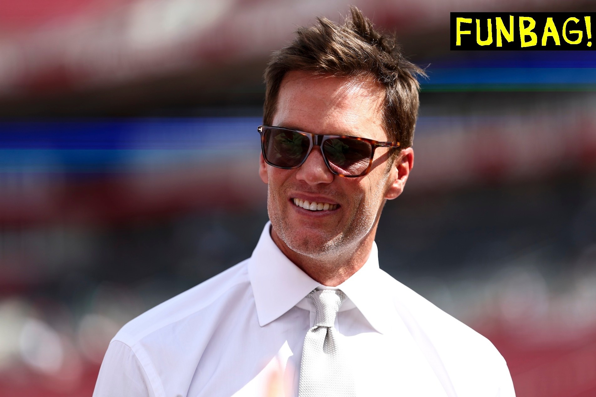 TAMPA, FLORIDA - SEPTEMBER 28: Fox Sports commentator and former NFL quarterback Tom Brady smiles prior to an NFL football game between the Tampa Bay Buccaneers and the Philadelphia Eagles at Raymond James Stadium on September 28, 2025 in Tampa, Florida. (Photo by Kevin Sabitus/Getty Images)