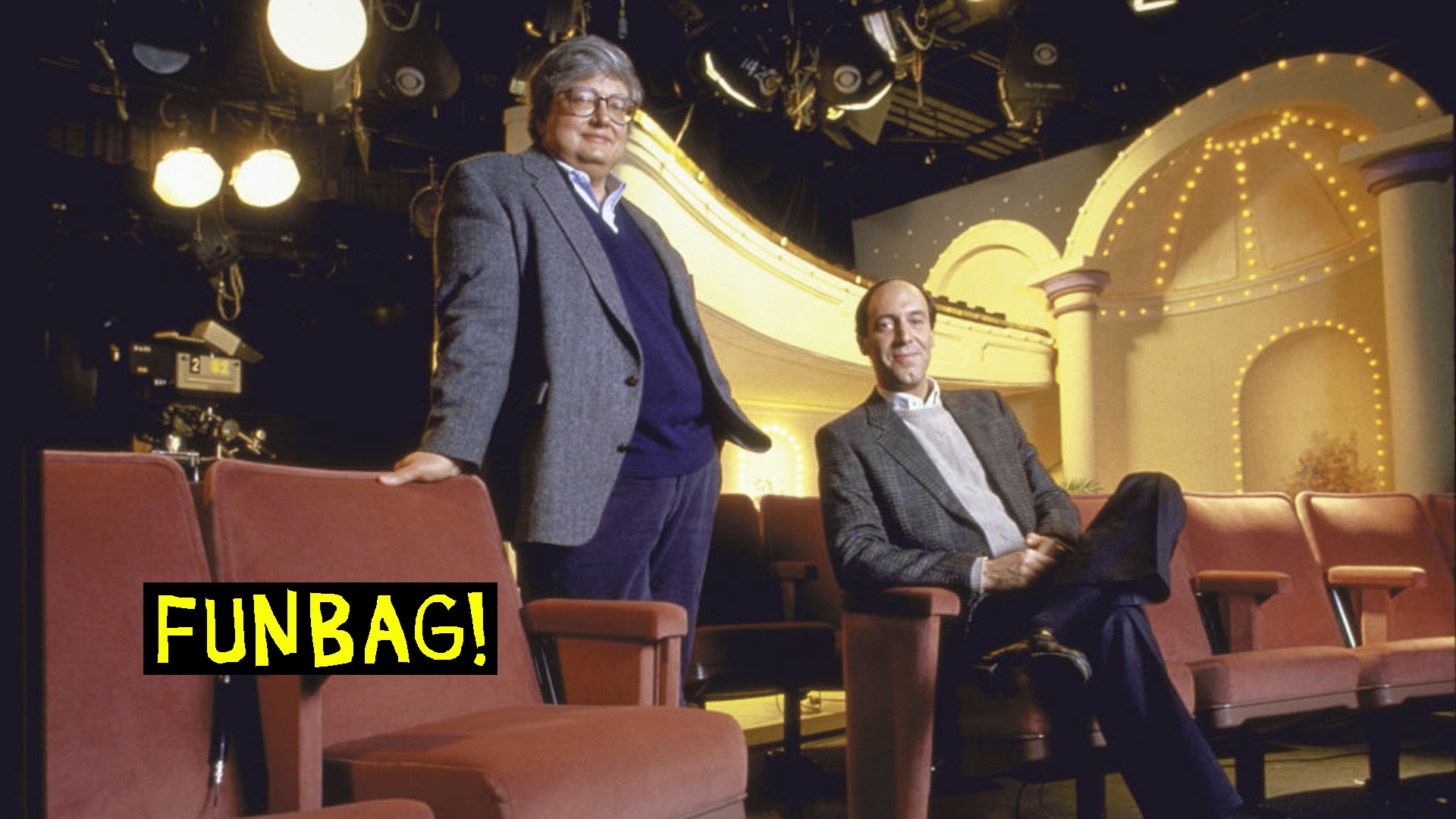 Roger Ebert (L) and Gene Siskel on the set of TV show Siskel and Ebert at the Movies.